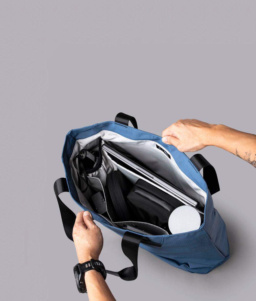 Alt View 4. ALPAKA - Elements Tote 20L Laptop Tote Bag with Padded 16" Sleeve,Open Top with Magnetic Closure - Blue Axoflux 210D.