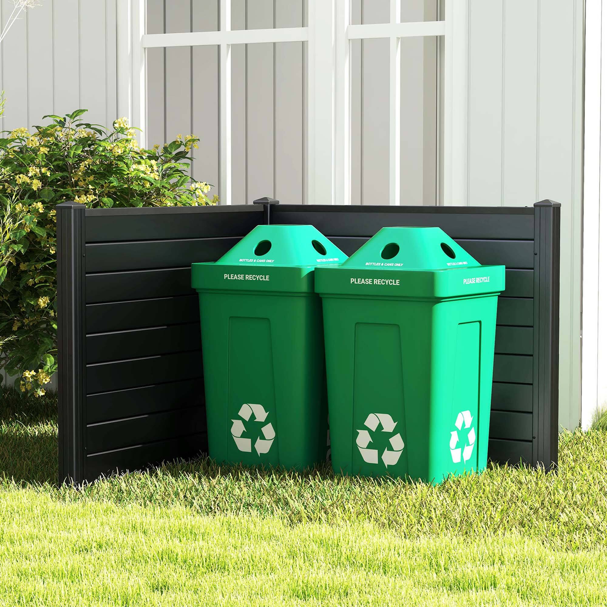 "Please recycle" is written on both green trash cans.