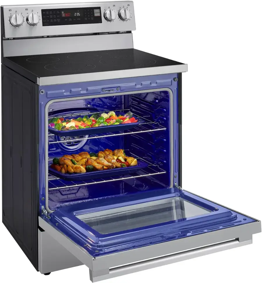 The image shows a blue oven with a tray of food inside. The oven is open, revealing the food. The oven is placed next to a stove top, which has a timer set at 2:35. The oven is a stainless steel model with a digital display.