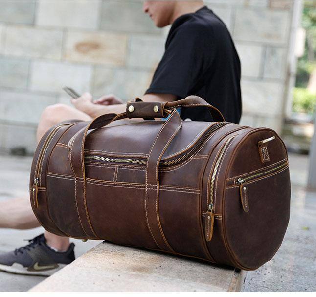 Left. Steel Horse Leather - The Wainwright Weekender | Round Vintage Leather Weekender - Dark Brown.