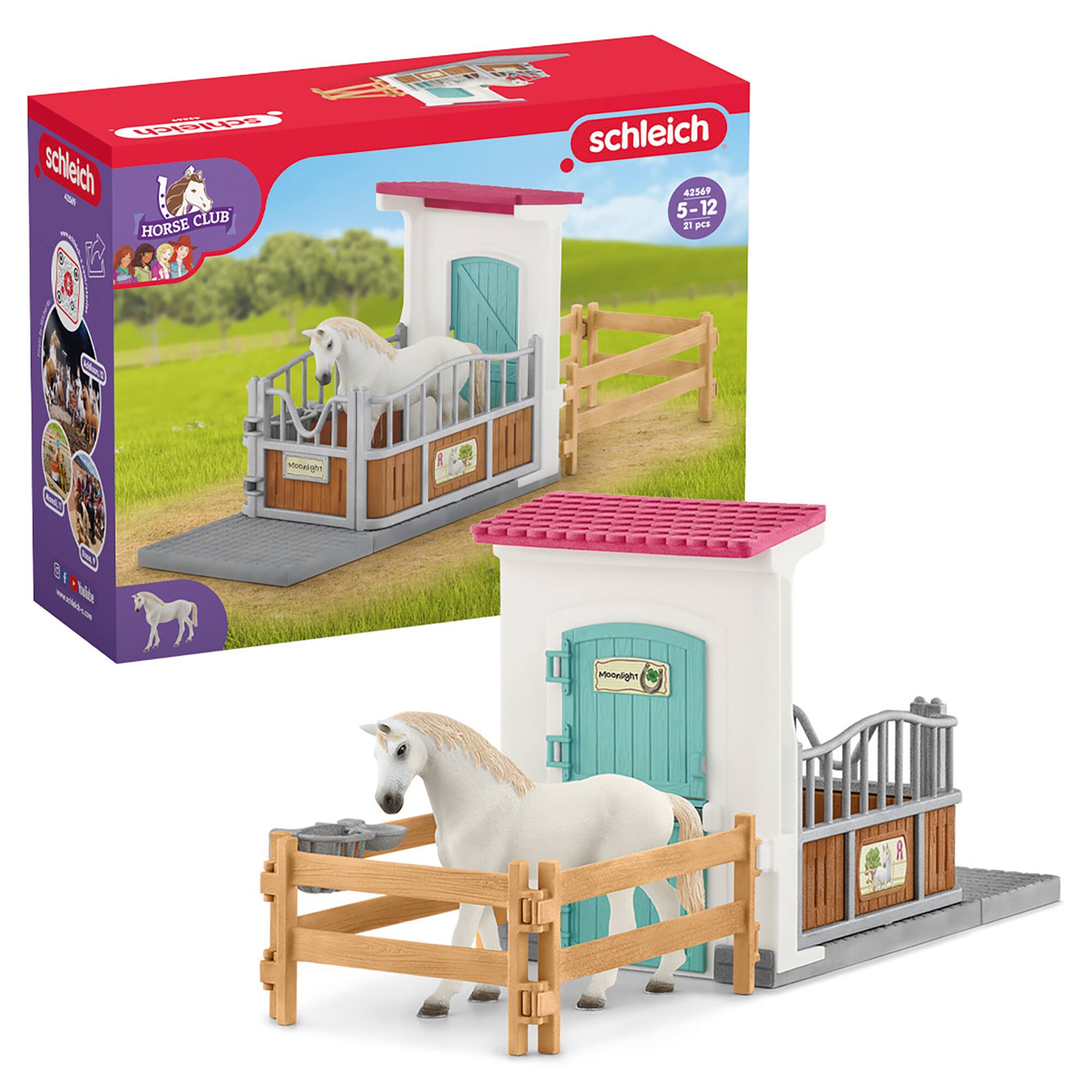 The image features a Schleich toy set, which includes a horse and a stable. The horse is standing next to the stable, which has a pink roof. The toy set is designed for children aged 5-12 years old and consists of 21 pieces. The horse is positioned in front of the stable, creating a charming scene for playtime.