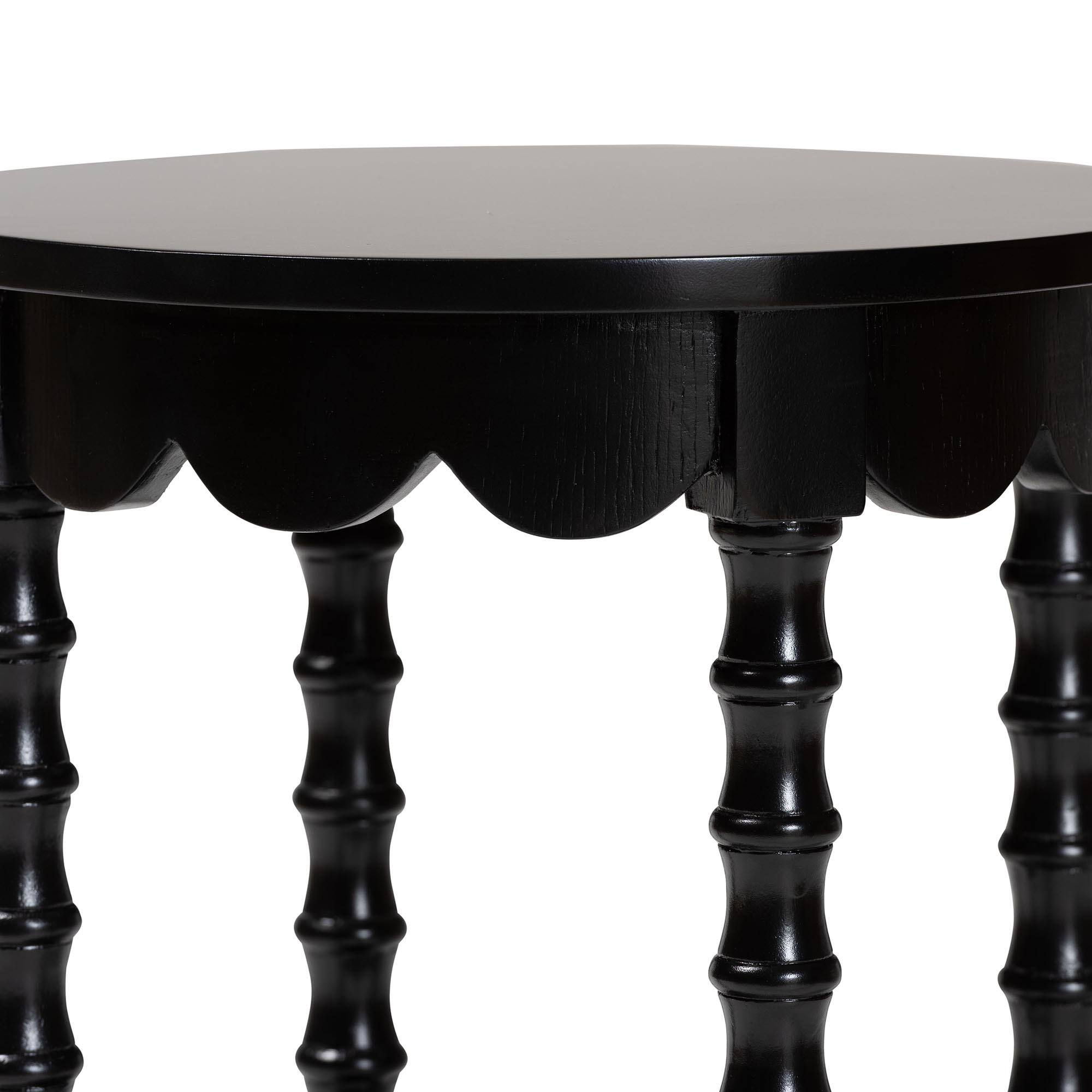 Left. bali & pari - Baxton Studio Sally Round Nightstand with Bamboo Inspired Legs - Scalloped Bedroom Side Table with Open Shelf, Black - Black.