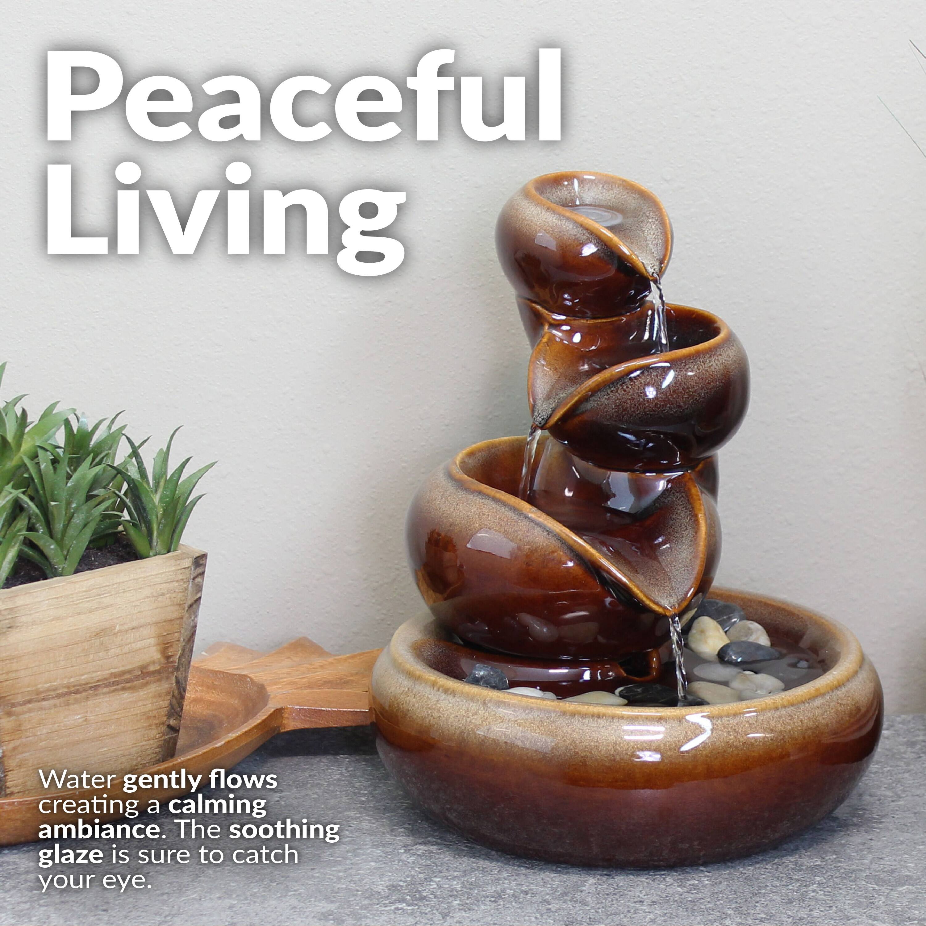 Peaceful Living

Water gently flows creating a calming ambiance. The soothing glaze is sure to catch your eye.