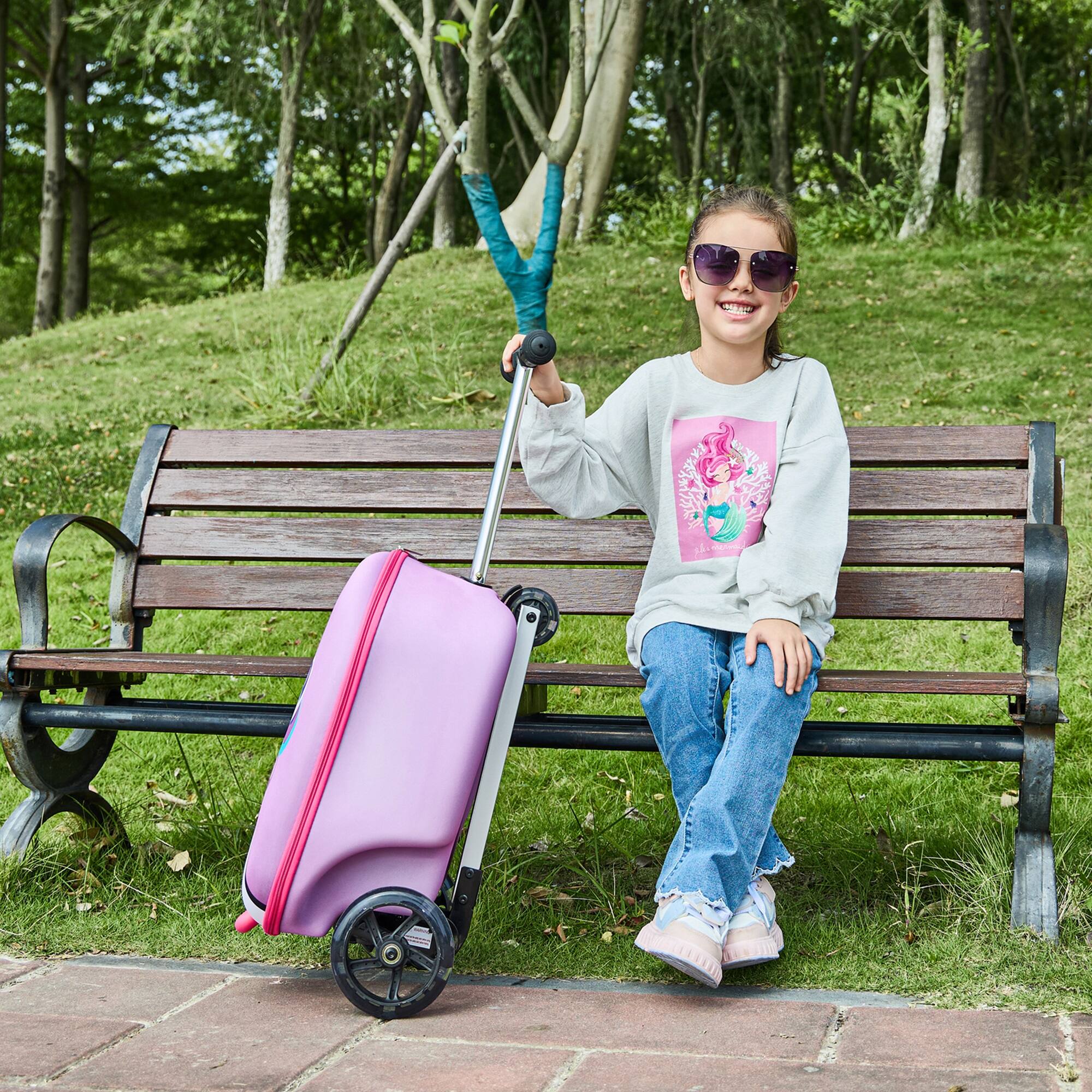 Angle. GoPowerBike - GoPowerBike GoVoyage 3-Wheel Kids Luggage Scooter with Light-Up Wheels | Pink - Pink.