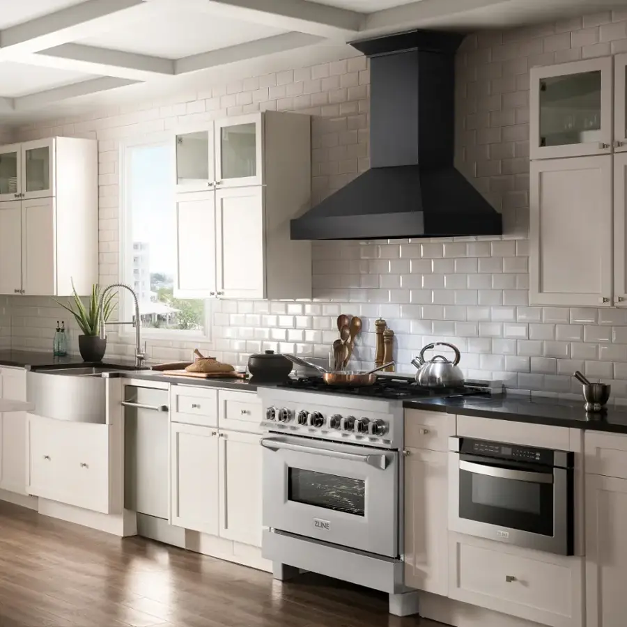 The image shows a kitchen with a stove top oven and a window above it. The oven is located under a hood, and the kitchen is equipped with white cabinets. The stove top oven is positioned between two drawers, and there is a potted plant near the window. The kitchen also features a sink, and various cooking utensils such as knives and spoons are visible on the countertop.