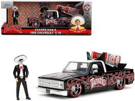 Jada - 1985 Chevrolet C-10 Pickup Truck Black with White Top and Graphics with Charro Man Diecast Figure "Tapatio" 1/24 - Black, White