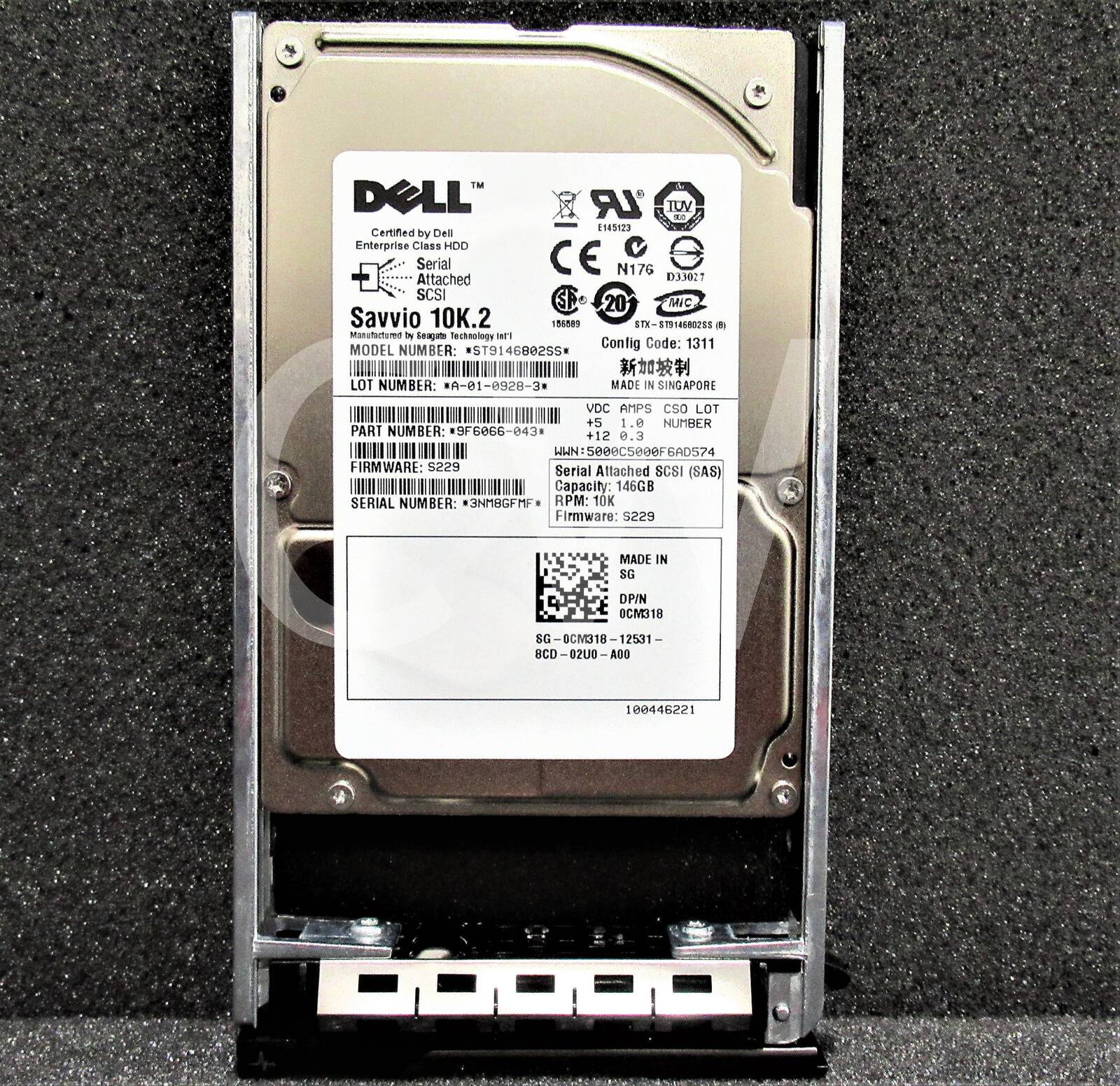 A DELL' LR TUV - 145123  
Certified by Dell Enterprise Class HDD  
Serial CE N176  
Attached D3627 SCSI  
20 MIC Savvio 10K.2  
STX-57014680085  
Manufactured by Seagate Technology Inc  
Config Code: 1311  
MODEL NUMBER: ST914680255  
LOT NUMBER: *A-01-0920-2  
PART NUMBER: 9F6866-843  
FIRMWARE: 5229  
SERIAL NUMBER: 3NMUGEN  
Capacity: 146GB  
RPM: 10K  
Firmware: 5229  
MADE IN SINGAPORE  
VDC AMPS CSO LOT +5 1.0 NUMBER +12 0.3  
HWN 5eeec5e0eF6AD574  
MADE IN SG  
DP/N DCM318 &G C318  
12531 BCD 0210 ADD 0044