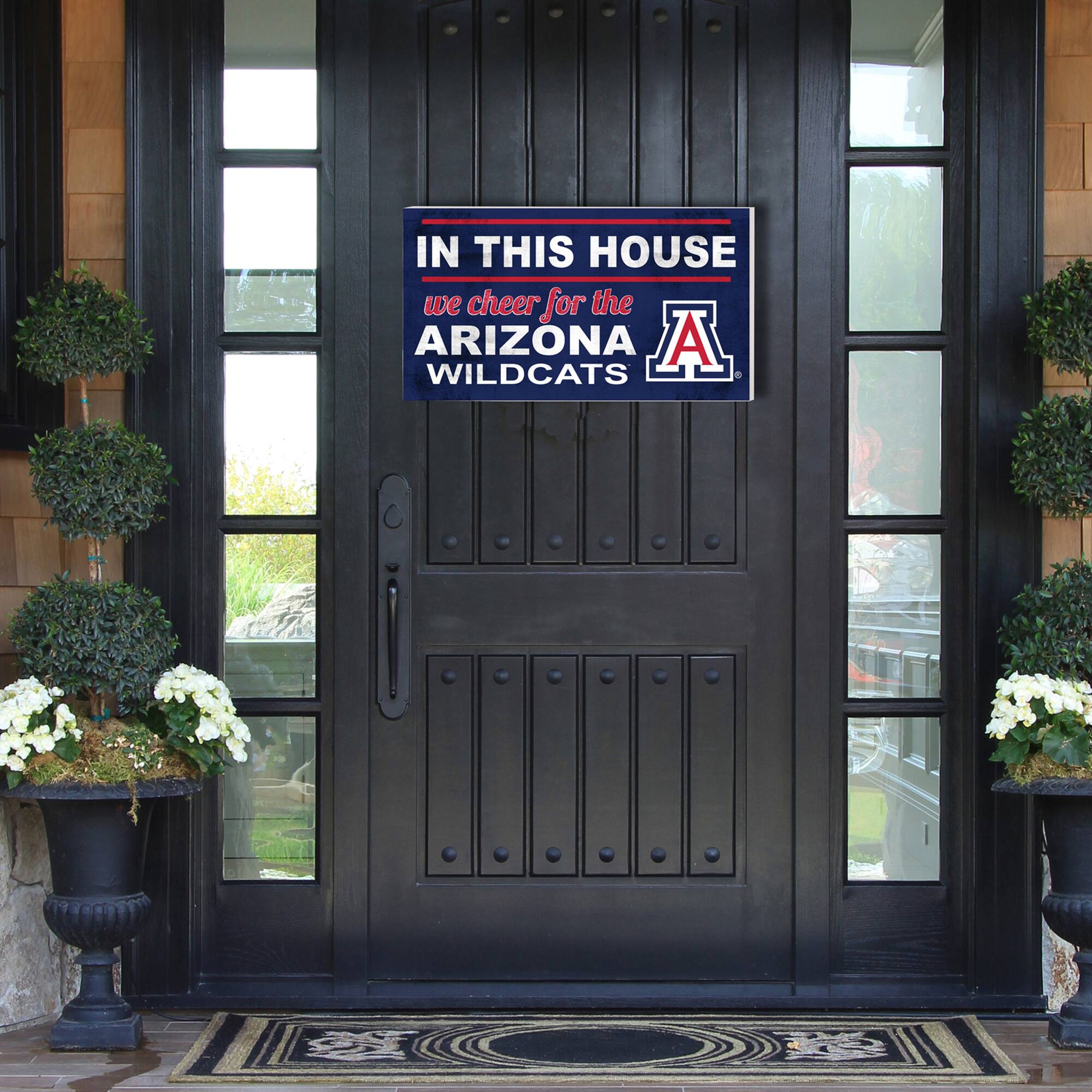 IN THIS HOUSE  
we cheer for the  
ARIZONA  
WILDCATS