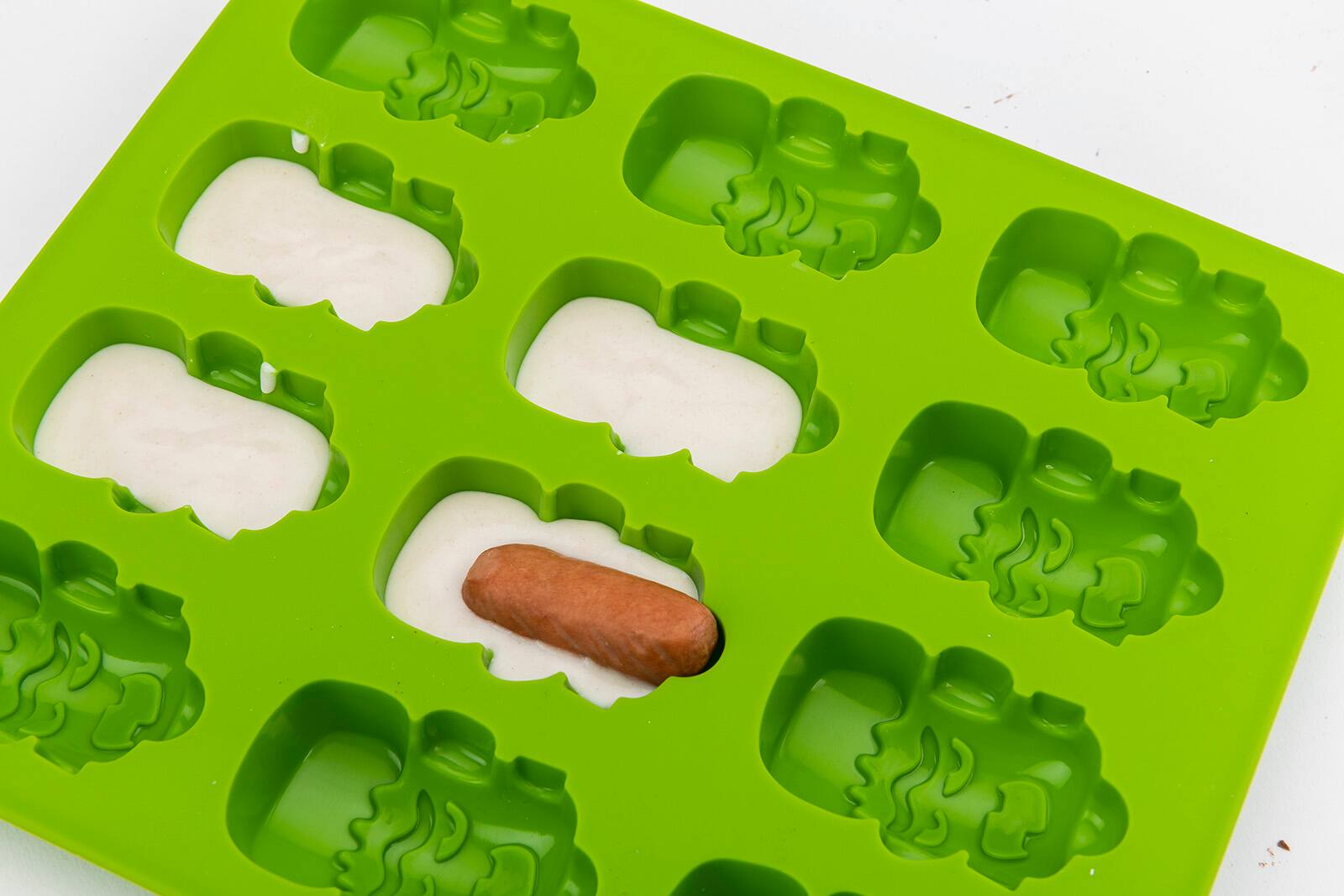 Alt View 3. MOBI - 12 Pigs in a Blanket Silicone Snack Mold, Franken-wennies - Green.