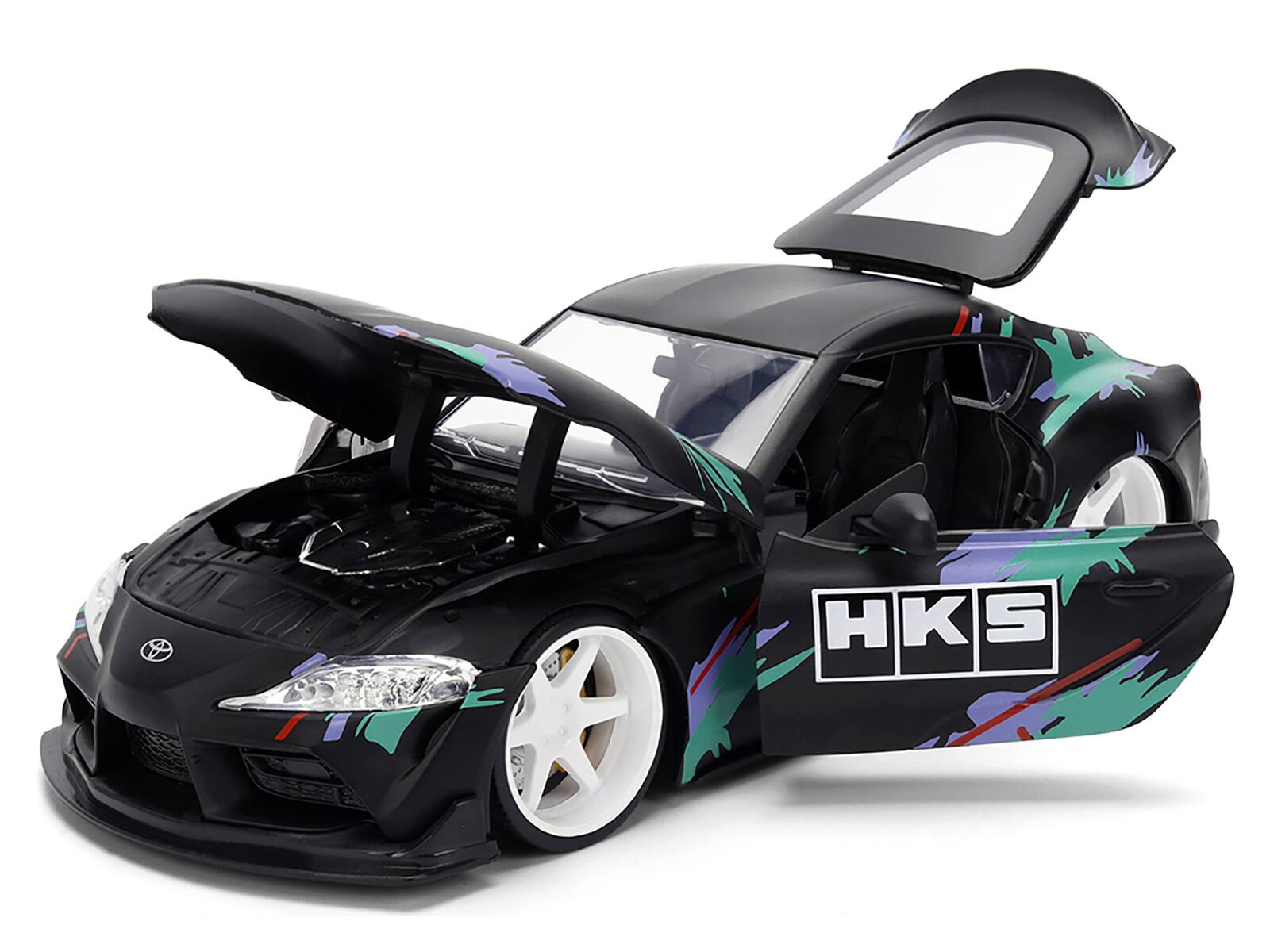 Angle. Jada - 2020 Toyota GR Supra "HKS" Matt Black with Graphics "JDM Tuners" Series 1/24 Diecast Model Car by Jada - Matt Black with Graphics.