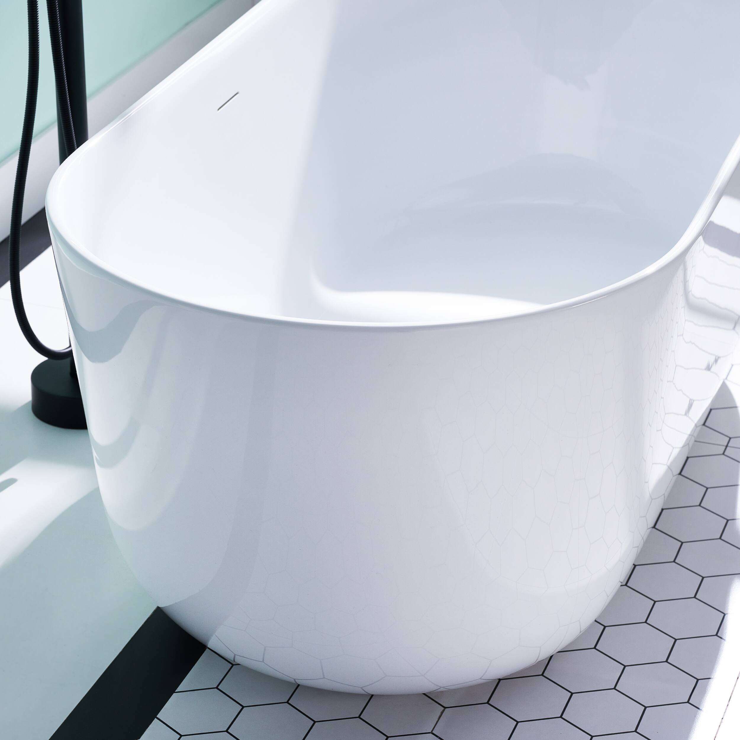 Alt View 2. WELLFOR - Seren 59 in. x 28 in. Acrylic Oval Freestanding Soaking Bathtub with Center Pop-Up Drain and Overflow - White.