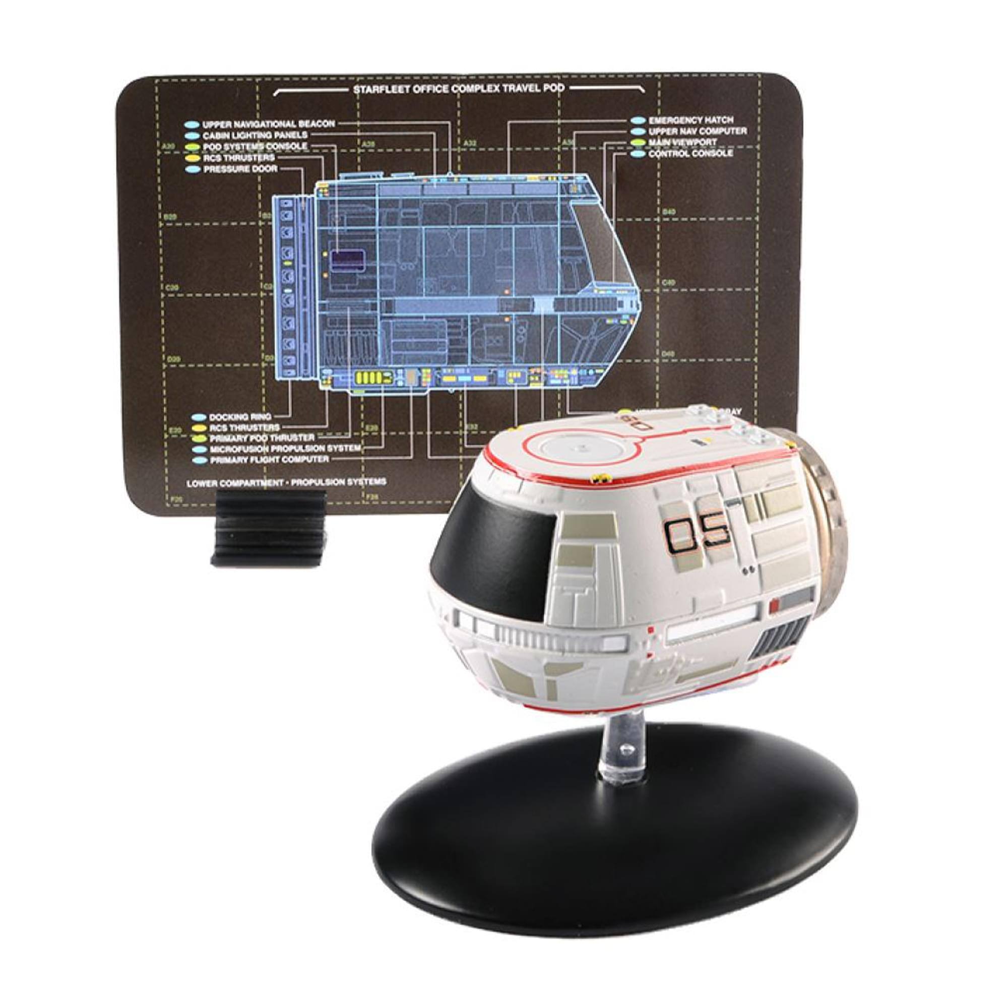STARFLEET OFFICE COMPLEX TRAVEL POD  
- UPPER NAVIGATIONAL BEACON  
- CABIN LIGHTING PANELS  
- POO SYSTEMS CONSOLE  
- RCS THRUSTERS  
- EAS PRESSURE DOOR  
- EMERGENCY HATCH  
- UPPER NAV COMPUTER  
- VIEWPORT CONTROL CONSOLE  
- DOCKING RING  
- RCS THRUSTERS  
- PRIMARY POO THRUSTER  
- MICROFUSION PROPULSION SYSTEM  
- PRIMARY FLIGHT COMPUTER  
- LOWER COMPARTMENT  
- PROPULSION SYSTEMS