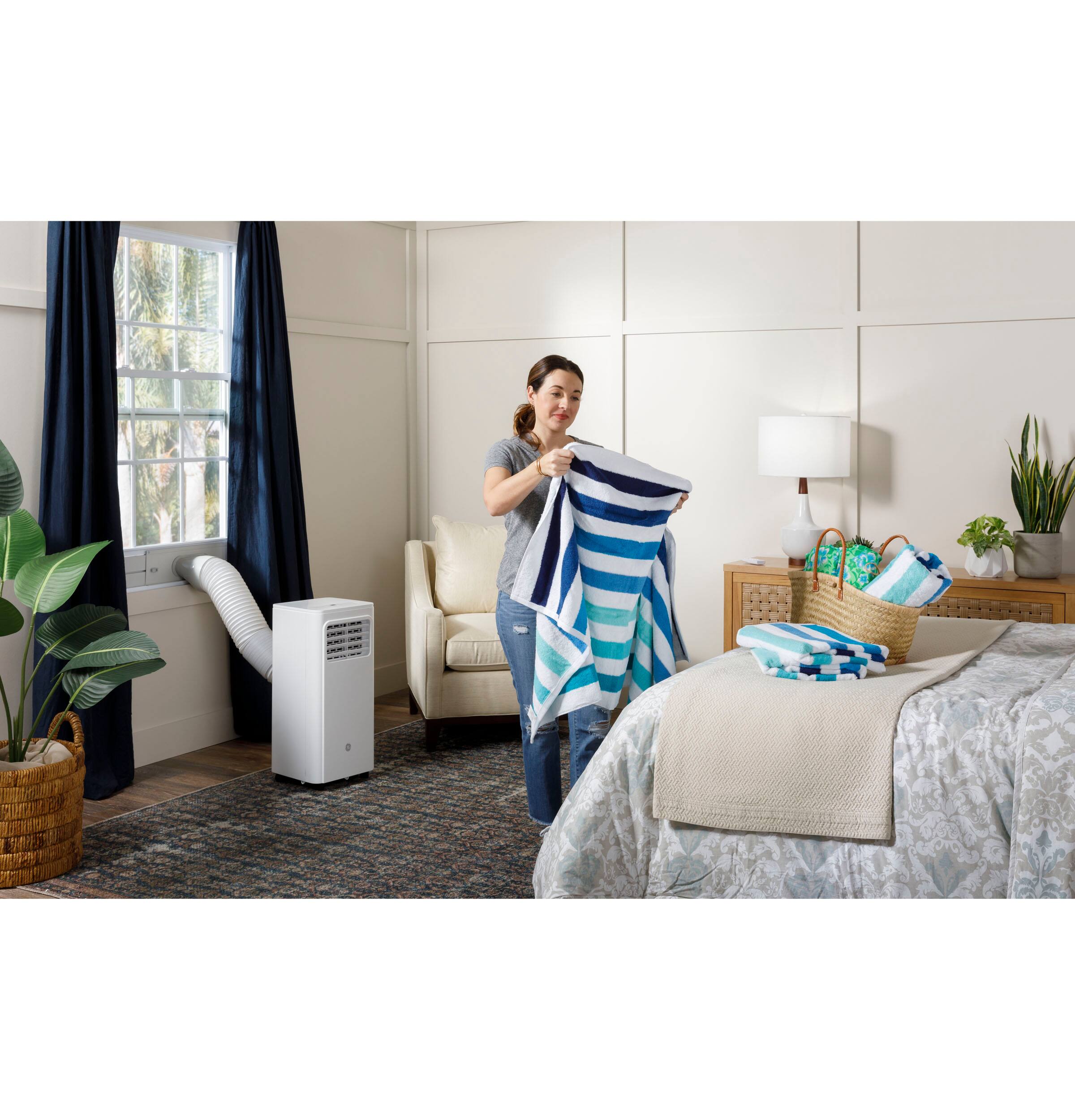 Alt View 16. GE - 250 Sq. Ft. 6,000 BTU Portable Air Conditioner with Auto Evaporation Technology - White.