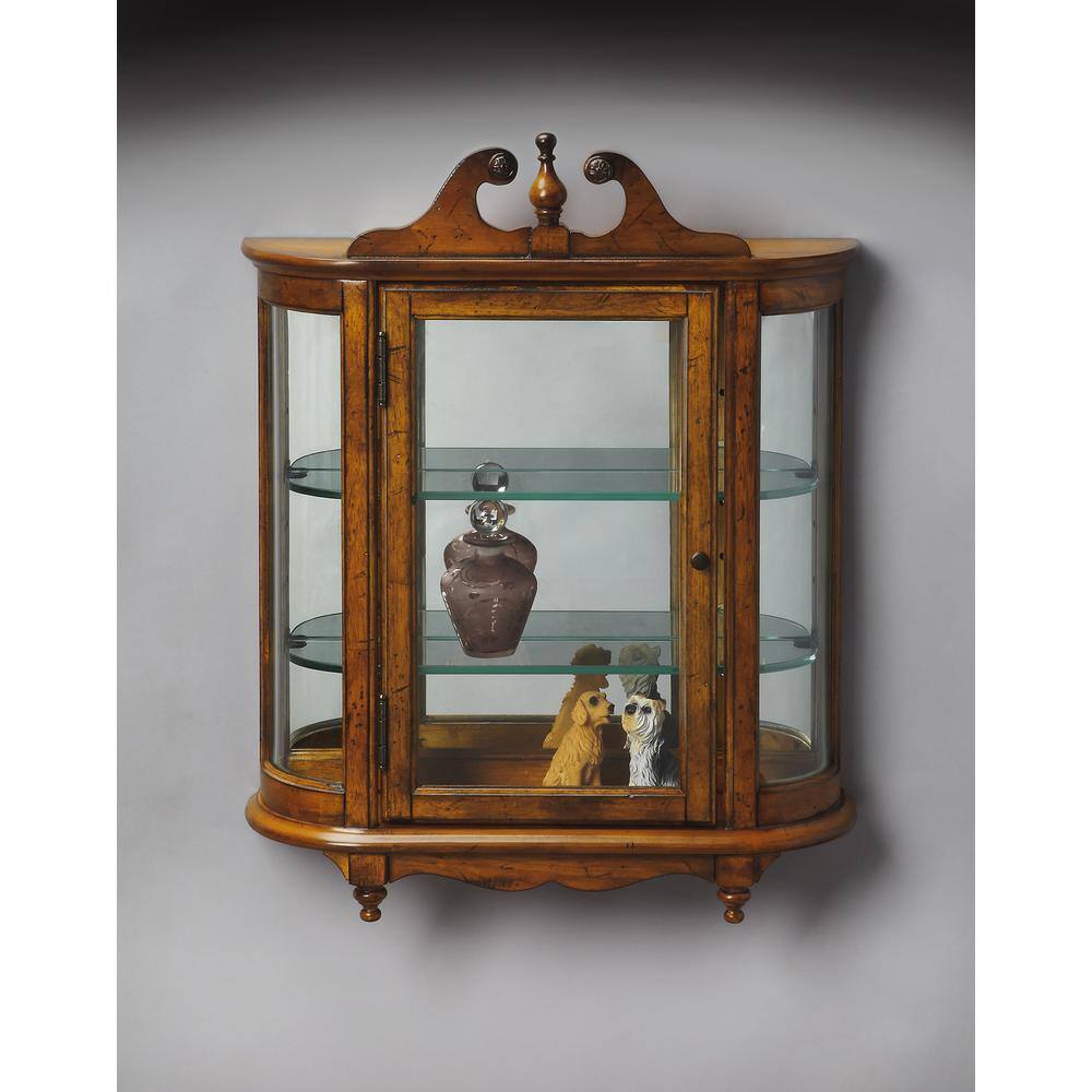 Left. Butler Specialty - Melinda Wall Curio - Medium Brown.