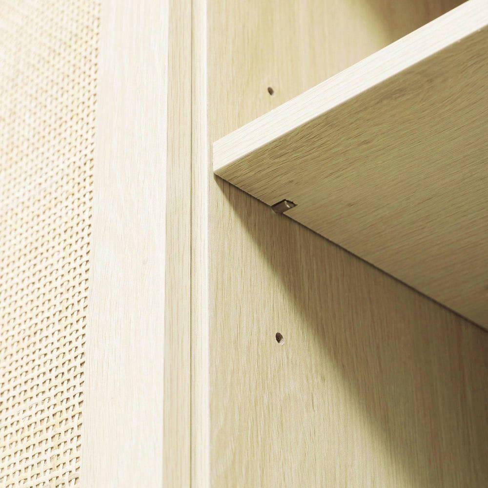 Angle. Kadyn - Boho Style Buffet with Three Rattan Doors and Adjustable Interior Shelves - Brown.