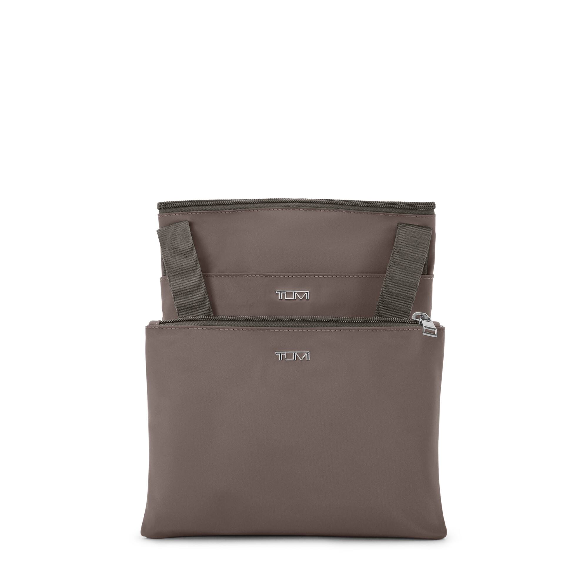 The text on the image is "TUMI."