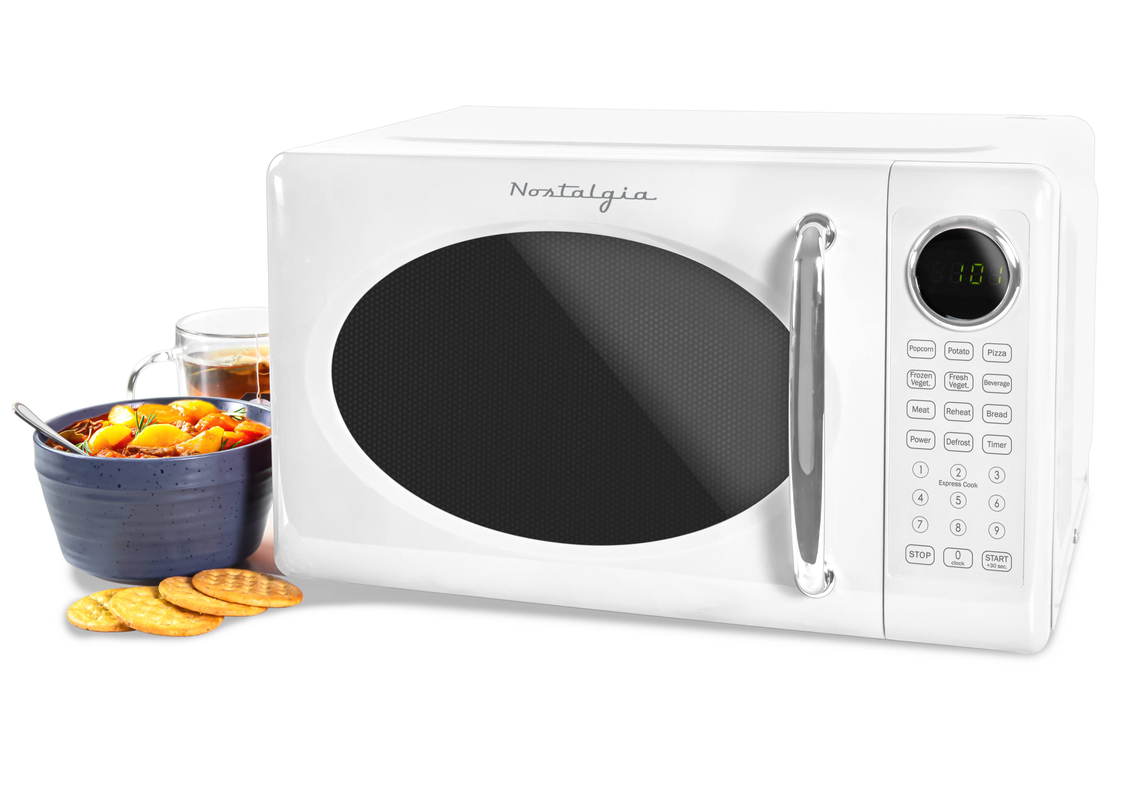 Nostalgia 6801: Popcorn, Potato, Pizza, Frozen Vegget, Fresh Vegget, Beverage, Meat, Reheat, Bread, Power, Defrost, Timer, Express Cook, 1, 2, 3, 4, 5, 6, 7, 8, 9, 0, STOP, START