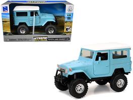 Toyota Land Cruiser FJ40 Light Top "Xtreme Off-Road" Series 1/24 Diecast Model by New Ray - Blue with White