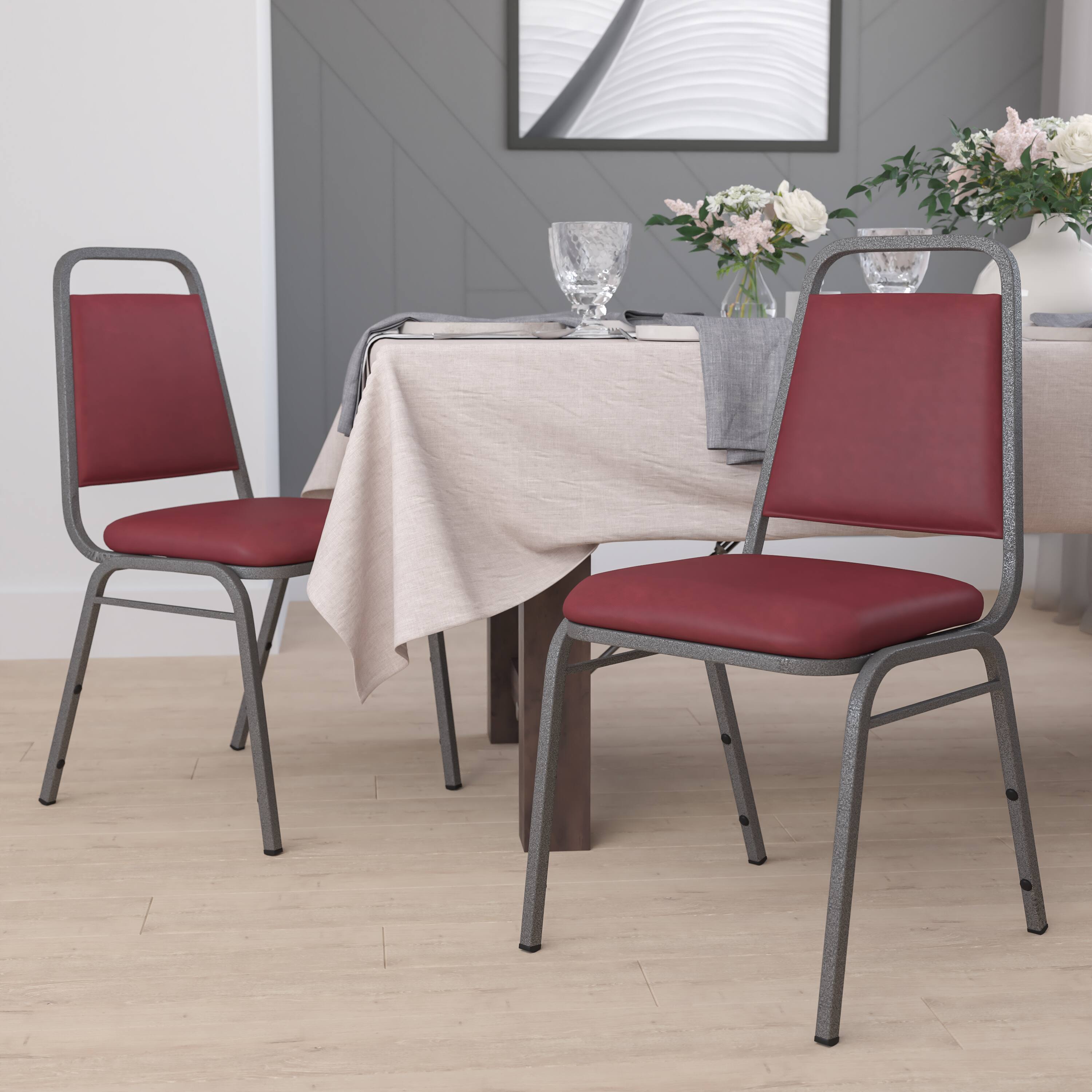 Alt View 2. Emma + Oliver - 4 Pack Trapezoidal Back Stacking Banquet Chair - Burgundy Vinyl/Silver Vein Frame.