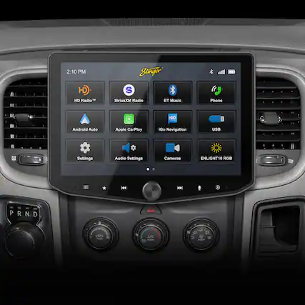 The text on the image is grouped and corrected as follows:
2:10 PM Stinger HD S HD Radio SiriusXM Radio BT Music Phone IGO Android Auto Apple CarPlay iGo Navigation USB C Settings Audio Settings Cameras ENLIGHT10 RGB H44 DN PRND P R N D . PUSH A/C - PUSH AE 2 $ PUSH