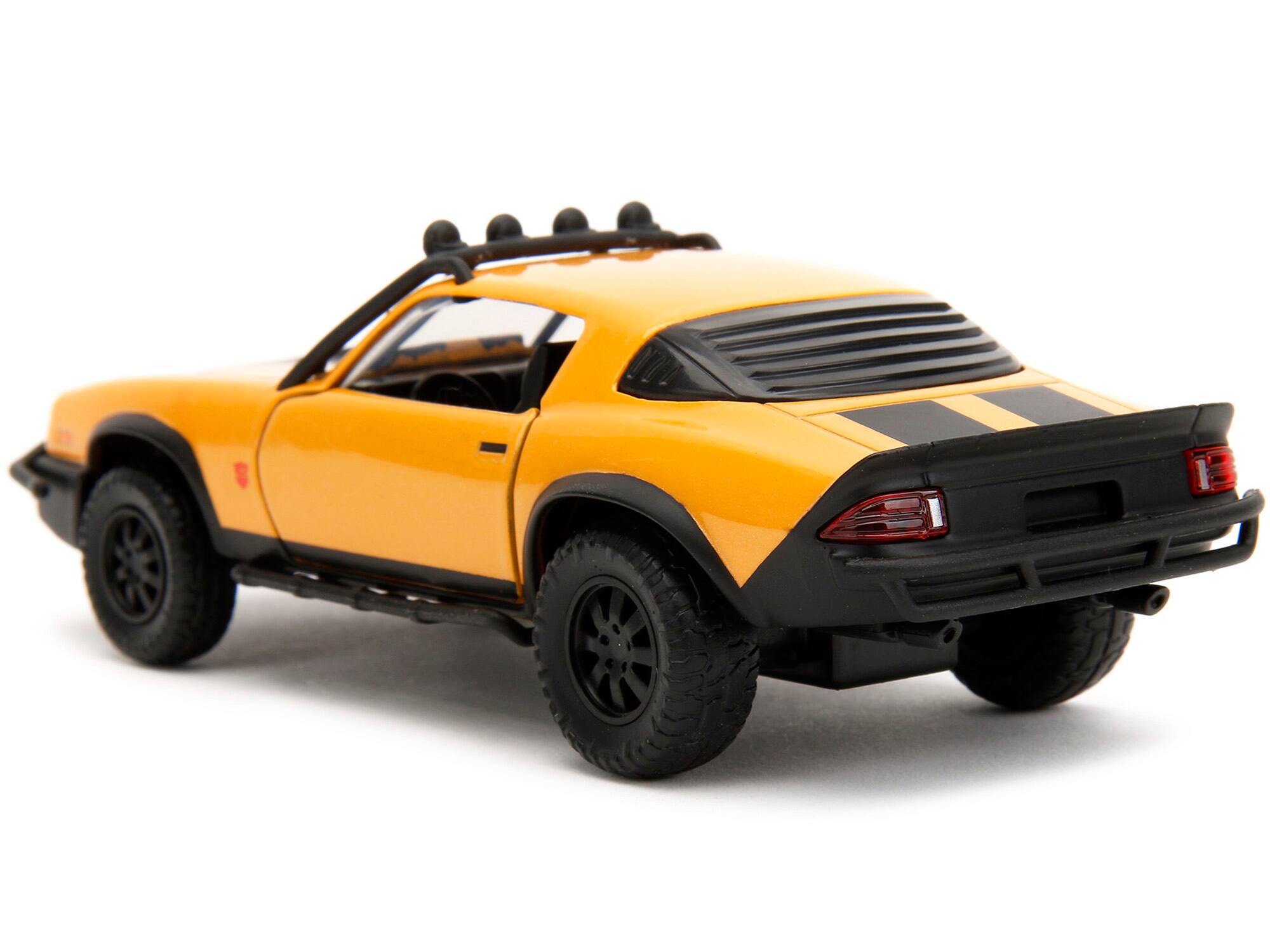 Alt View 1. Jada - 1977 Chevrolet Camaro Off-Road Yellow Metallic Black Stripes Transformers Rise of the Beasts 2023 Hollywood Rides 1/32 - Yellow Metallic With Black.