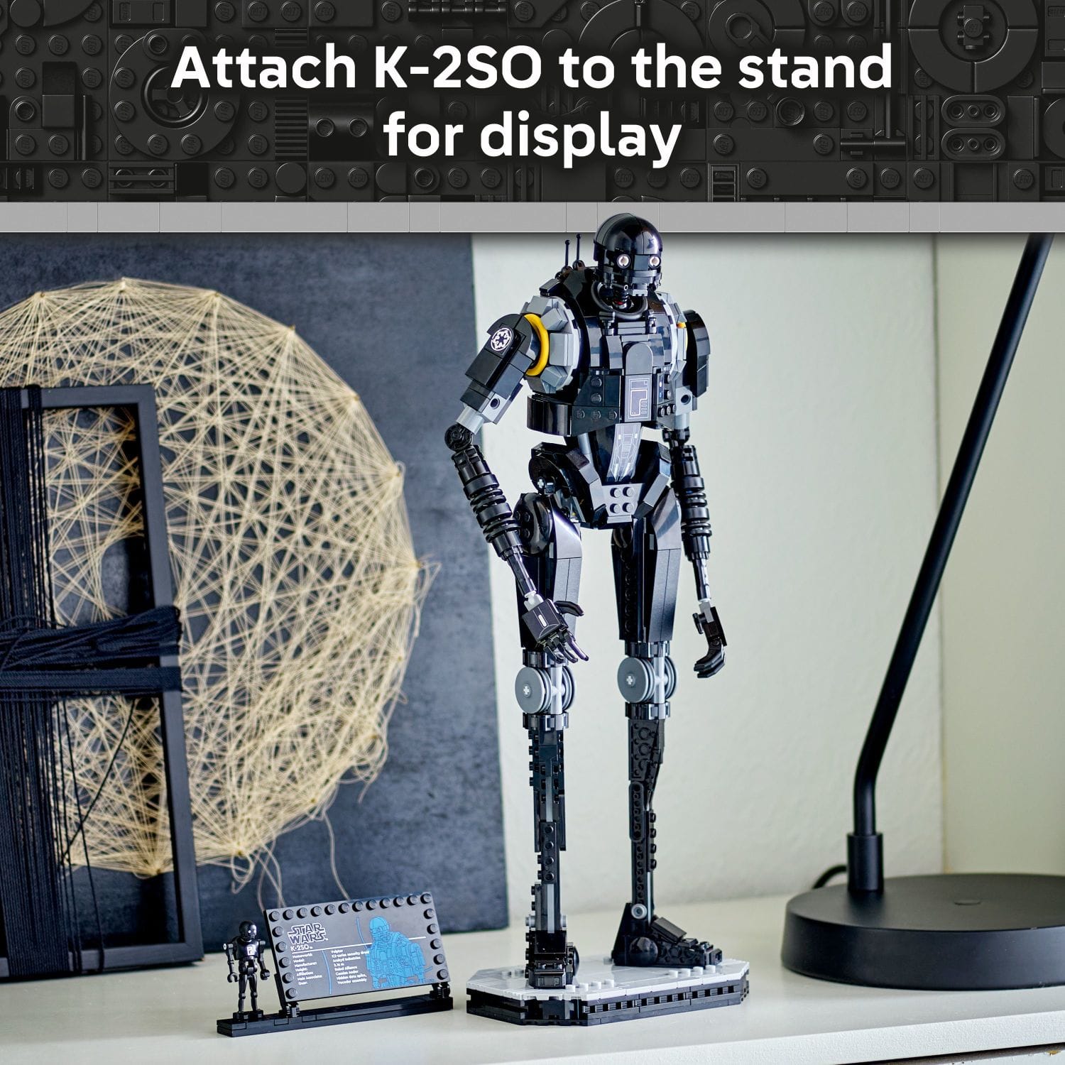 Attach K-2SO to the stand for display. SAO WILS