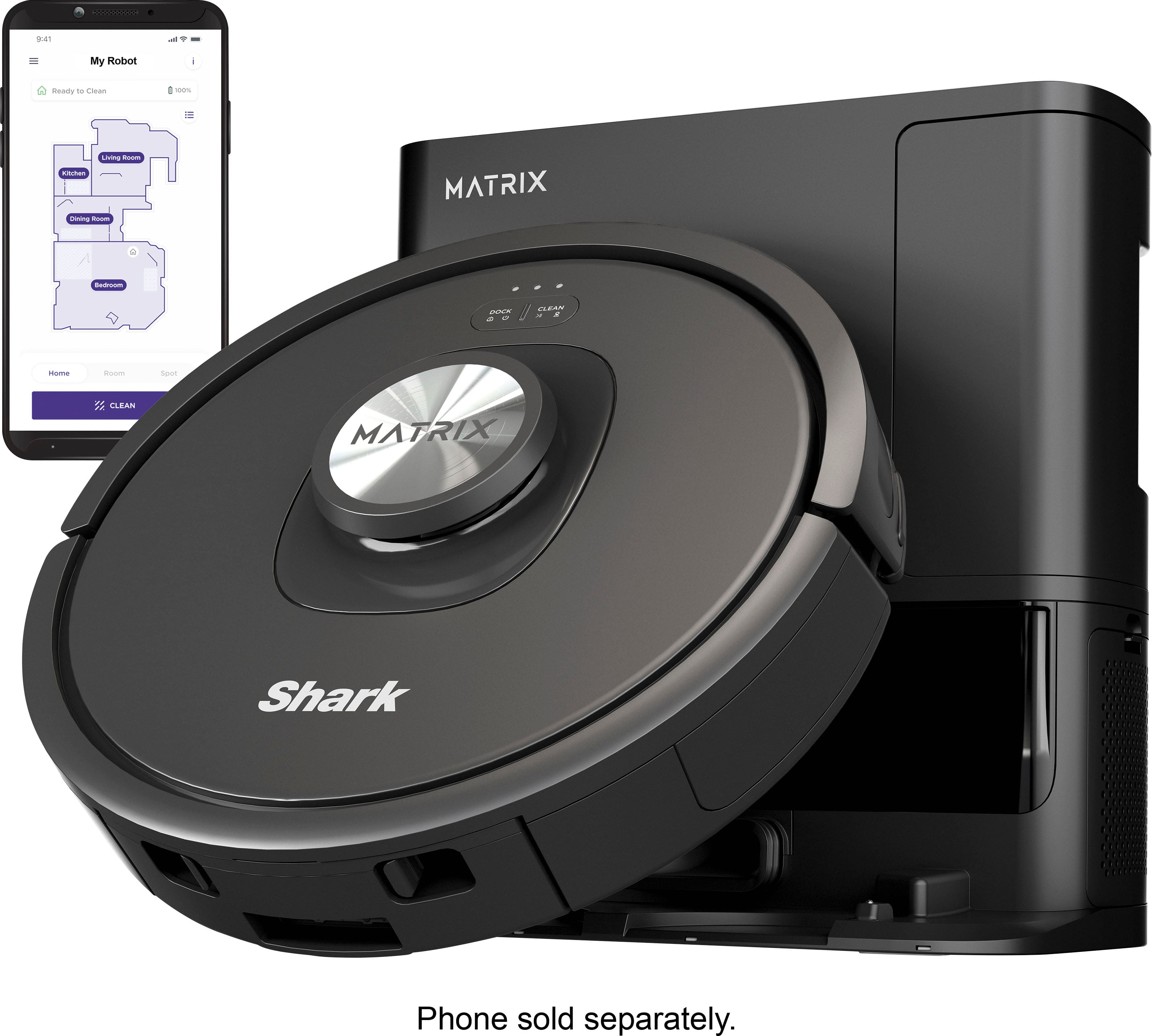 The image features a black robotic vacuum cleaner, which is a Shark Mattrx. The vacuum is sitting next to a cell phone, which is sold separately. The robotic vacuum is designed to clean and maintain the cleanliness of the floor.
