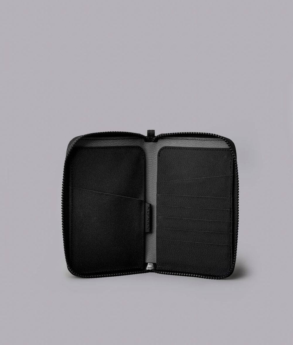 Left. ALPAKA - RFID Zip Passport Wallet with Boarding Pass Pocket, 7 Card Slots, Magnetic Flaps, Detachable Hand Strap - Black Axogrid 300D.