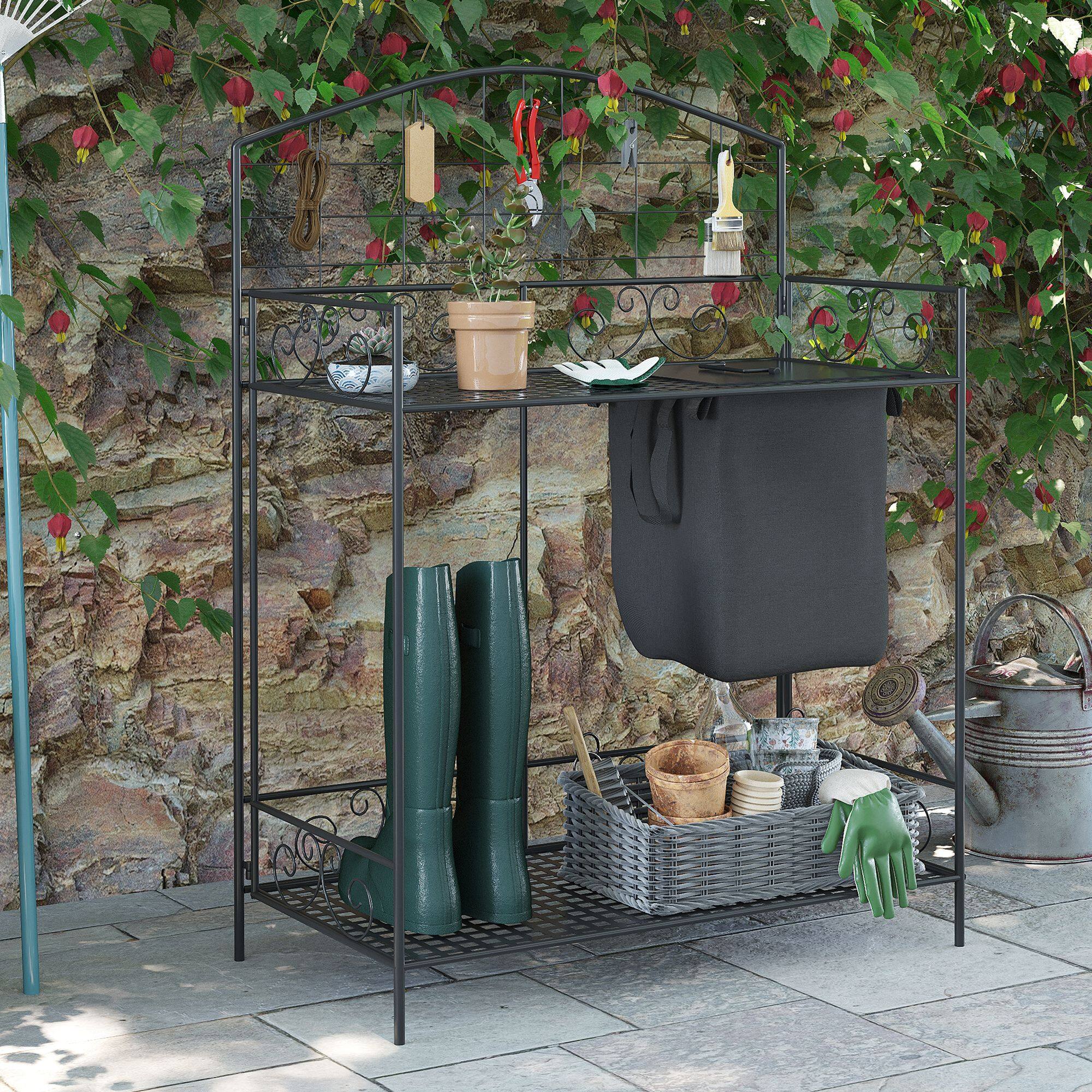 Alt View 1. Outsunny - Potting Bench Table, Metal Garden Workstation, Work Bench with Large Build-In Bag with Cover - Black.
