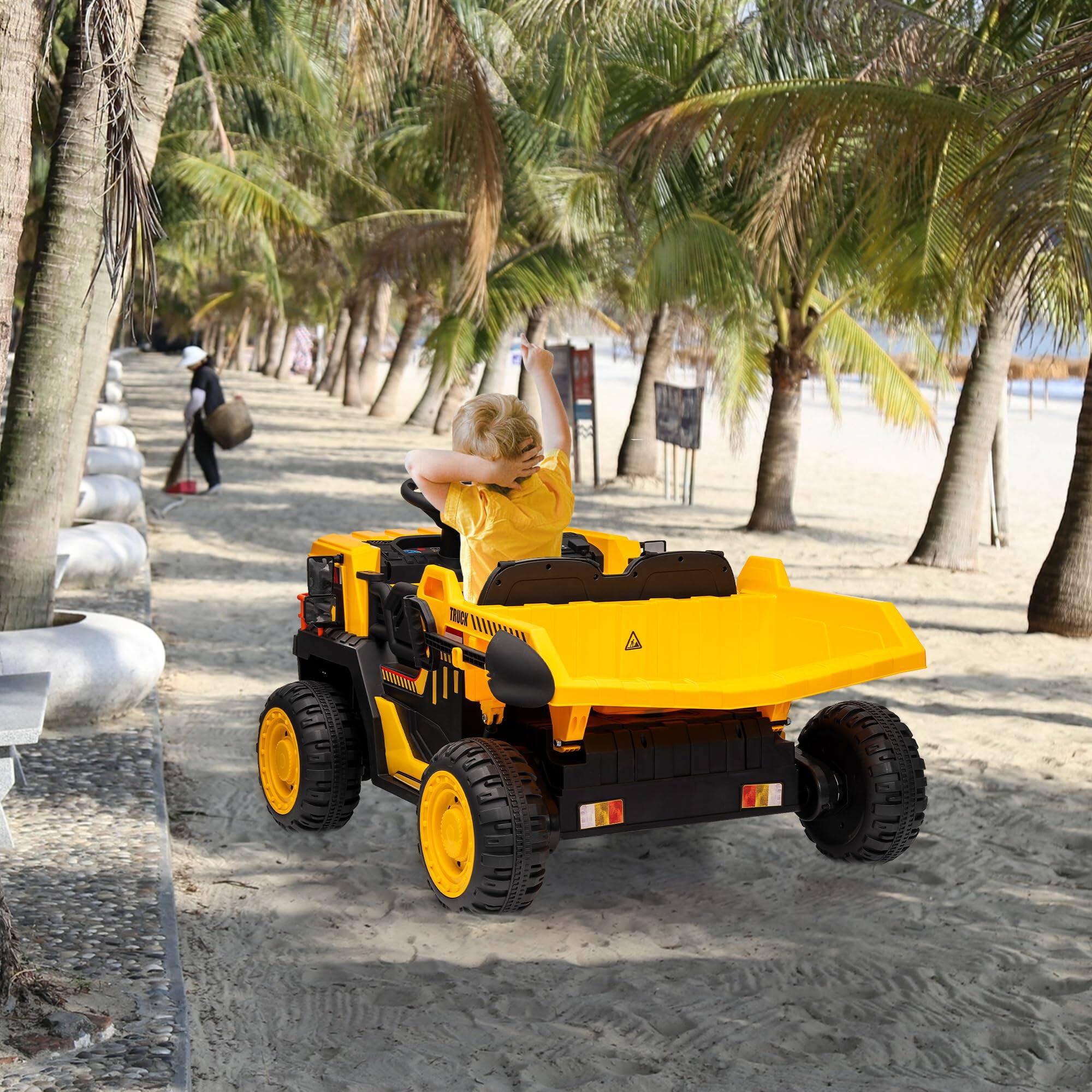 Left. GARVEE - Ride on Dump Truck with Dump Bed, 24v Ride on Construction Vehicle with Remote Control, Extra Shovel, 3 Speeds.