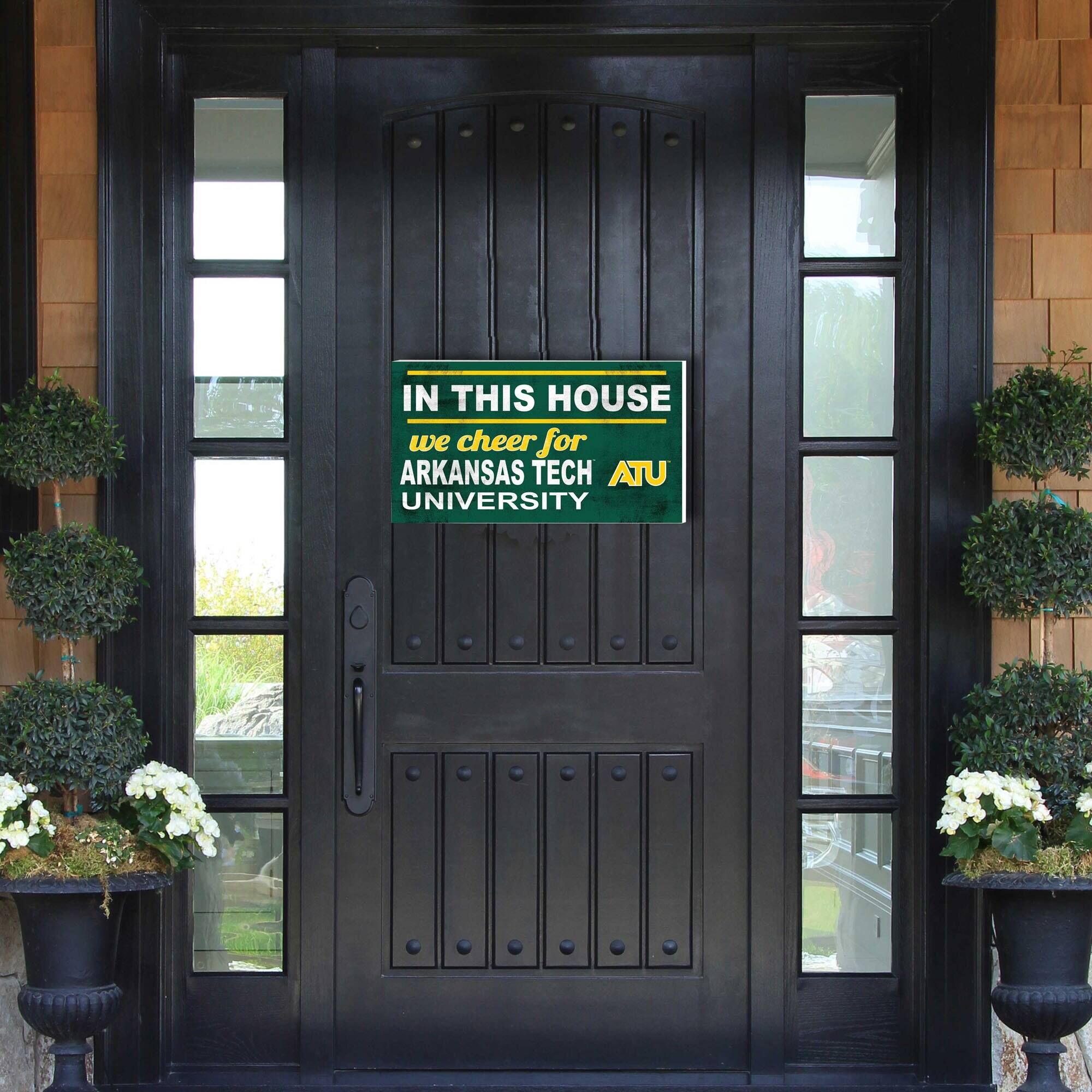 IN THIS HOUSE  
we cheer for  
ARKANSAS TECH UNIVERSITY  
ATU