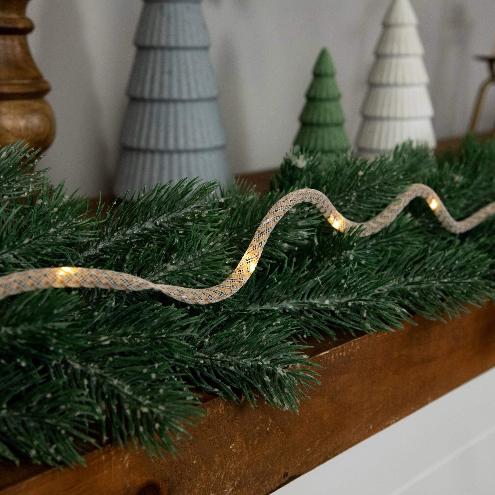 Front. Northlight - Pre-Lit Battery Operated Rope Christmas Garland - 6.75' x .25" - Warm White Lights - White.