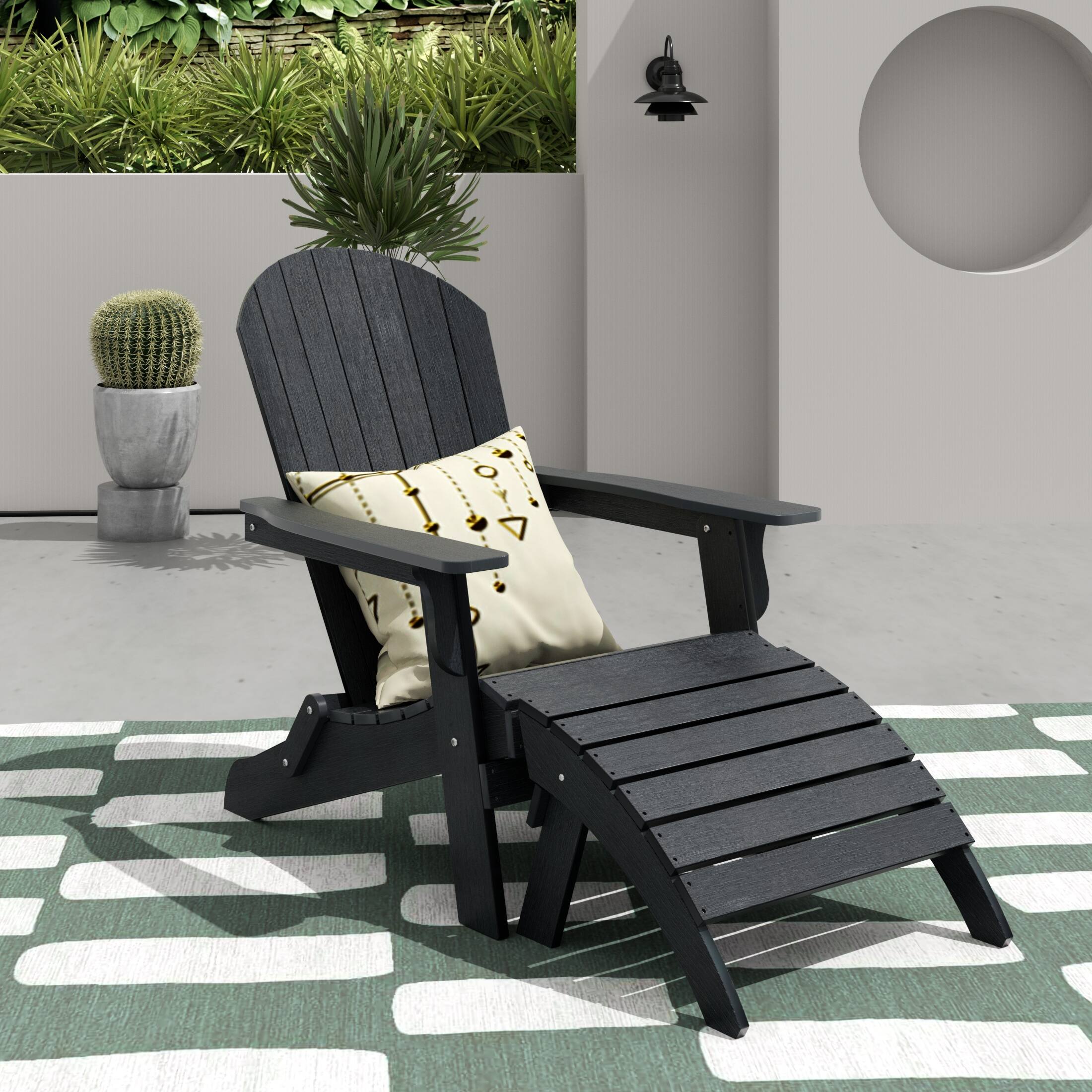 Angle. WestinTrends - WestinTrends Tuscany 2-Piece HIPS Outdoor Folding Adirondack Seashell Chair With Folding Ottoman - Black.
