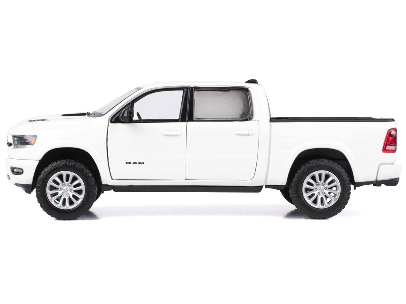 Left. Motormax - 2019 RAM 1500 Laramie Crew Cab Pickup Truck White "Timeless Legends" Series 1/24 Diecast Model Car by Motormax - White.