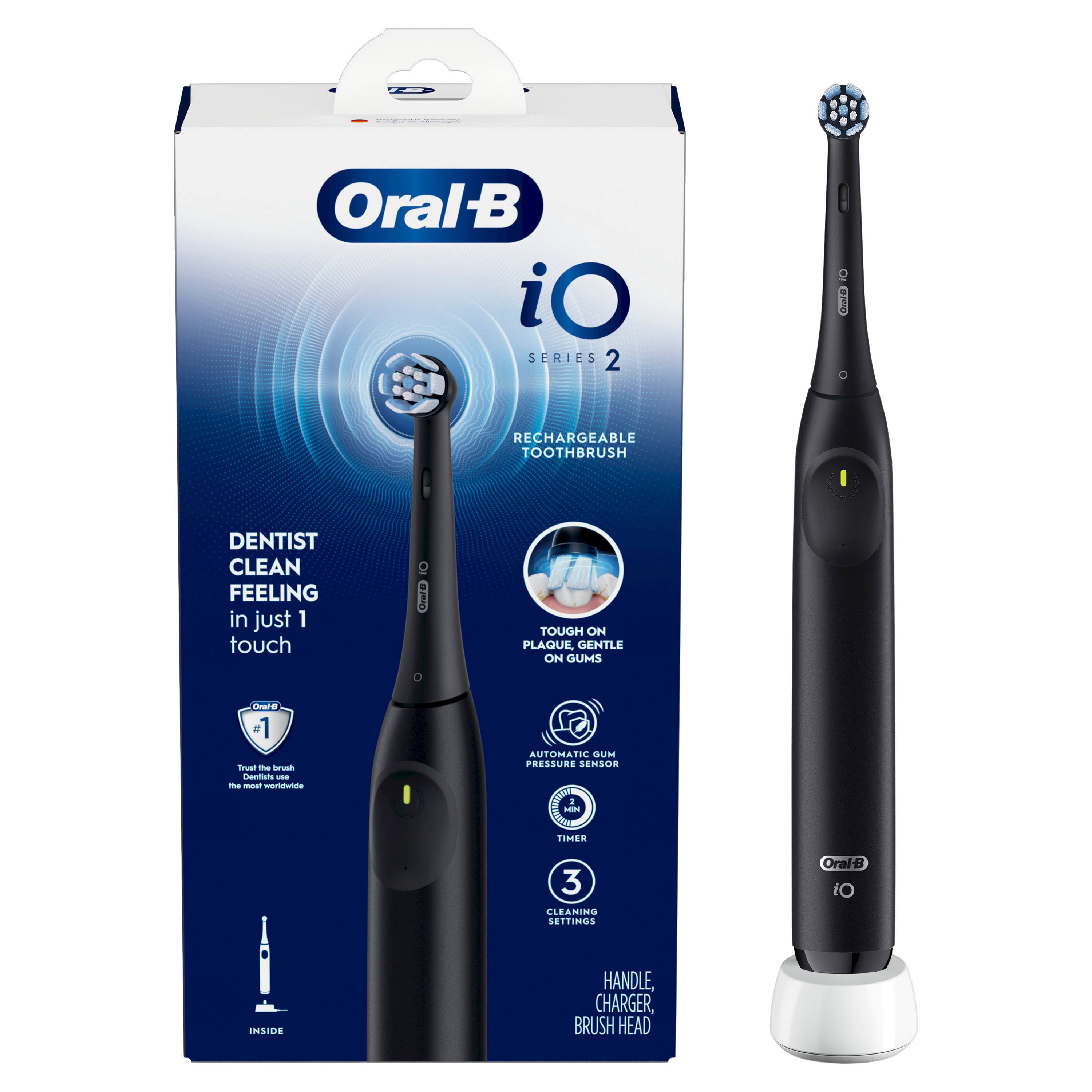 OralB iO SERIES 2 BA RECHARGEABLE TOOTHBRUSH DENTIST CLEAN FEELING in just 1 touch Gera TOUGH ON PLAQUE GENTLE ON GUMS Aa + 1 a Trust - rvan ammuts - t - wiahctute AUTOMATIC GlsE PRESSURE SENSOR MI FINER 3 CLEANING SEITINGS Orais iO NSIDE HANDLE, CHARGER, BRUSH HEAD