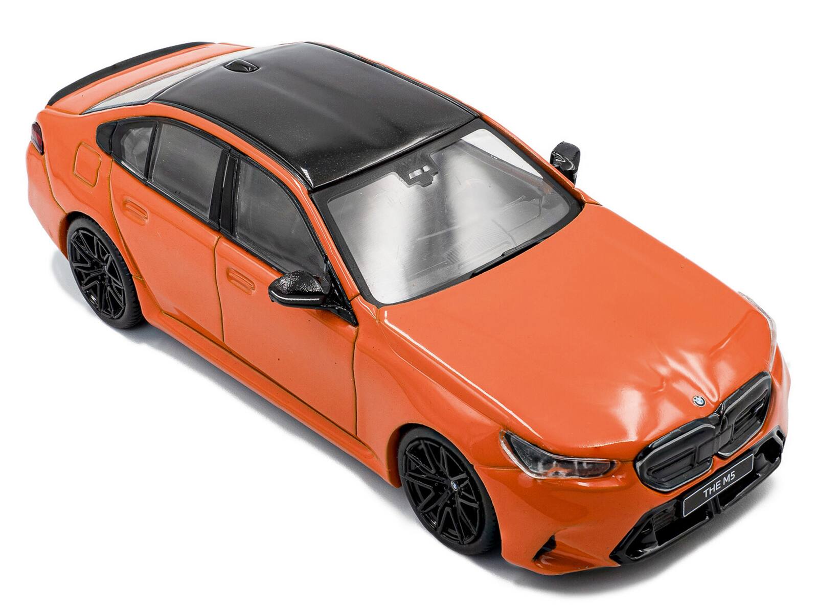 Alt View 5. Solido - 2024 BMW M5 Sedan Fire Orange III with Black Top 1/43 Diecast Model Car by Solido.