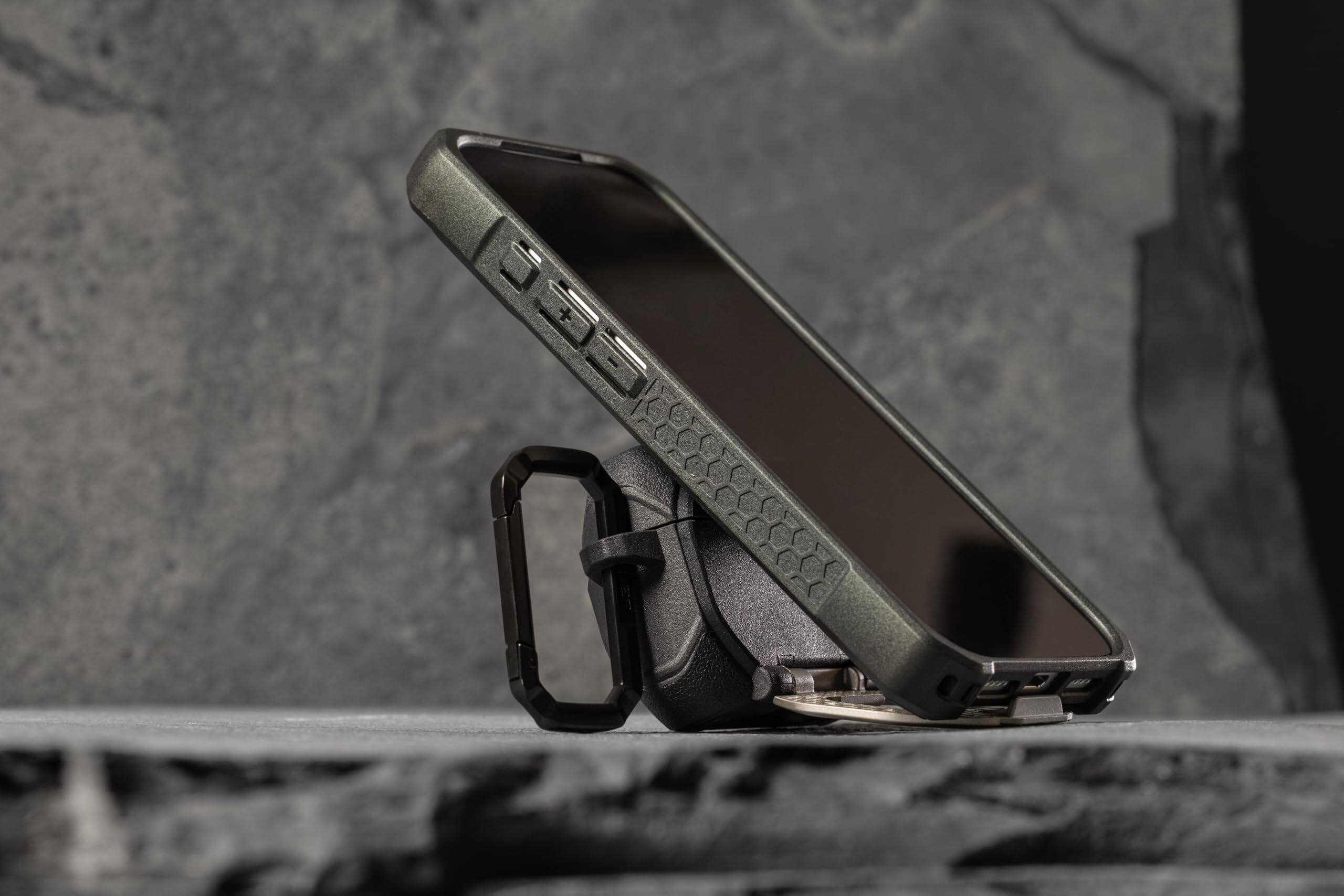 Alt View 2. UAG - AirPods Pro 3rd Gen Case w/ Built-in Phone Stand & Detachable Carabiner Clip, Rugged Protective Cover, Monarch - Olive Drab/Silver.