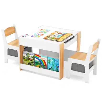 The image shows a white dining table with a wooden top and a white chair on each side. The table is adorned with a variety of children's books, including "Rainbow Fish" and "Sea Friends." The books are arranged neatly on the table, creating an inviting and educational atmosphere for children to enjoy their meals and engage in reading activities.