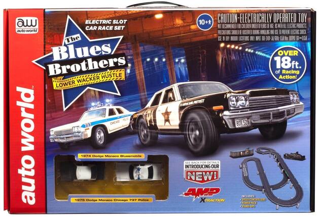 ELECTRIC SLOT CAR RACE SET
auto world
The Blues Brothers
LOWER WACKER HUSTLE
10+
CAUTION - ELECTRICALLY OPERATED TOY
NOT RECOMMENDED FOR CHILDREN UNDER 10 YEARS OF AGE. WITH ALL ELECTRIC PRODUCTS, PRECAUTIONS SHOULD BE OBSERVED DURING HANDLING AND USE TO PREVENT ELECTRIC SHOCK. USE IN DRY INDOOR LOCATIONS ONLY. INPUT: 100-240V~50/60Hz. CAUTION: OUTPUT 115V.
OVER 18ft. of Racing Action!
1974 Dodge Monaco Bluesmobile
1975 Dodge Monaco Chicago 737 Police
INTRODUCING OUR NEW!
AMF XTRACTION SPEED CONTROLLERS POWER PACK STAND-UPS
SEE BACK FOR DETAILS