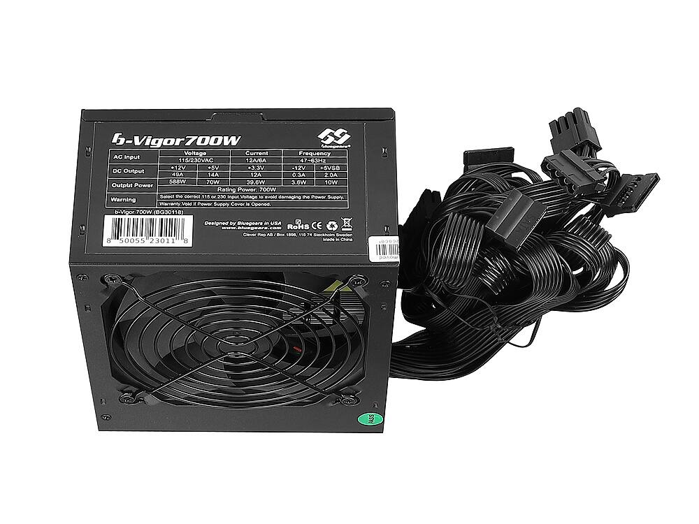 Here is the corrected and grouped text from the image:

**6-Vigor700W**

**AC Input:**
- Voltage: 115/230VAC
- Current: 12A/6A
- Frequency: 47-63Hz

**DC Output:**
- +12V: 14A (588W)
- +3.3V: 20A (70W)
- -12V: 0.3A (3.8W)
- -5V: 0.3A (1.5W)

**Output Power Rating:**
- Total: 700W

**Warning:**
- Do not open the power supply.

**Designed by:**
- Bluegears, USA

**Certifications:**
- RoHS, CE

**Made in:**
- China

**Model:**
- BG30118

**Serial Number:**
- 50055230118

**Additional Information:**
- Warranty Void if opened.
- Designed in Sweden.