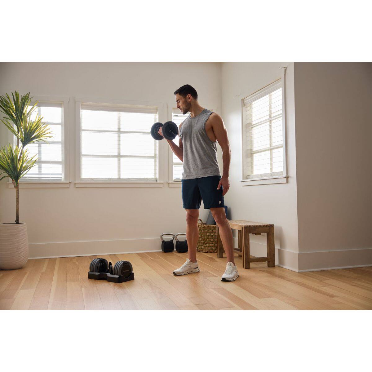 Left. NordicTrack - Set of Two NordicTrack 55 lb. Adjustable Dumbbells - Black.