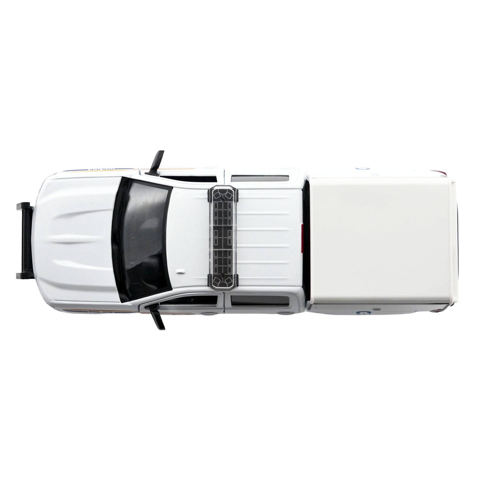 Alt View 5. Motormax - 2017 Chevrolet Silverado 1500 LT Z71 Crew Cab Truck with Camper Box "RCMP" White 1/24-1/27 Diecast Model Car by Motormax.