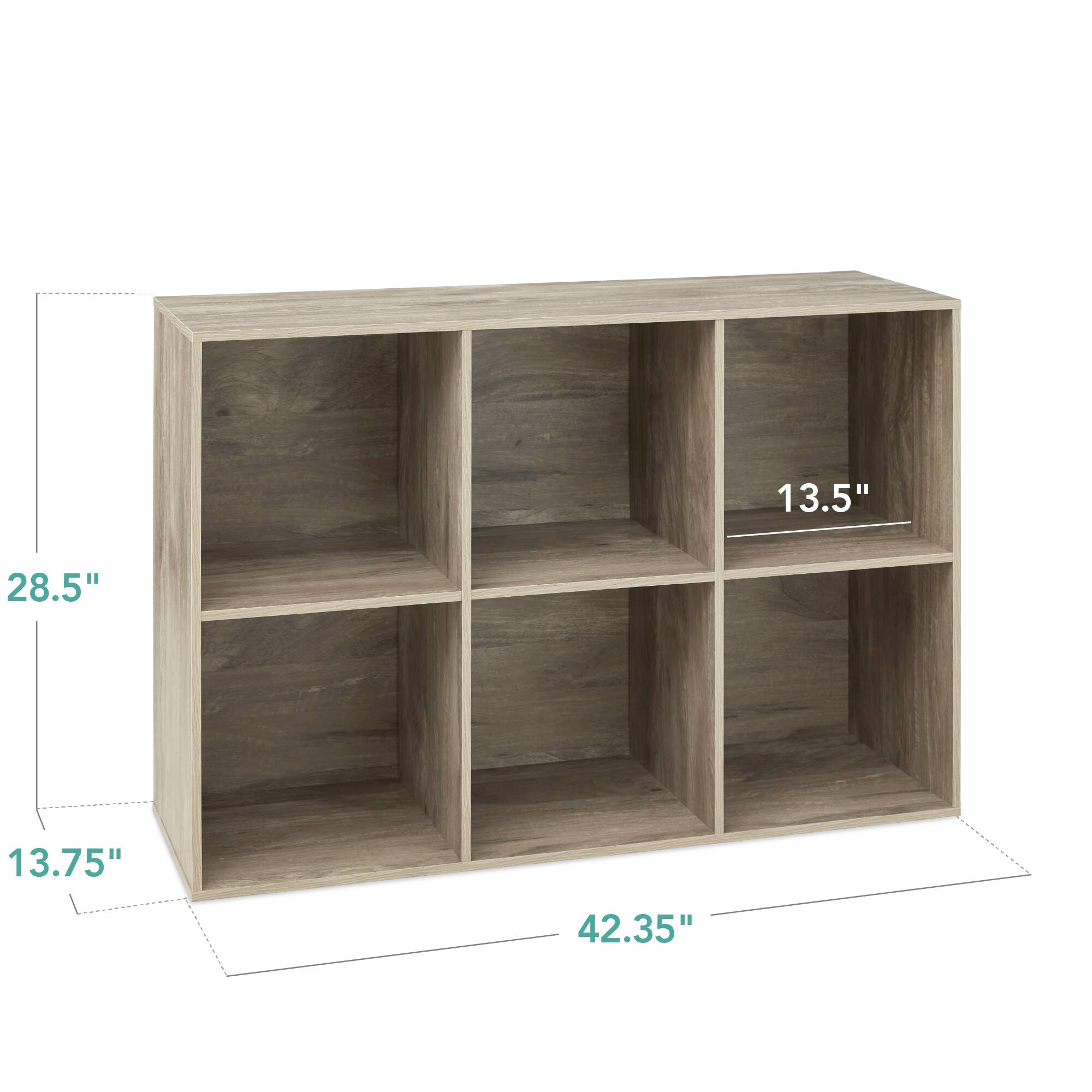 The dimensions of the shelf are:

- Height: 13.5 inches
- Width: 42.35 inches
- Depth: 13.75 inches

The shelf has two compartments, each with a height of 28.5 inches.