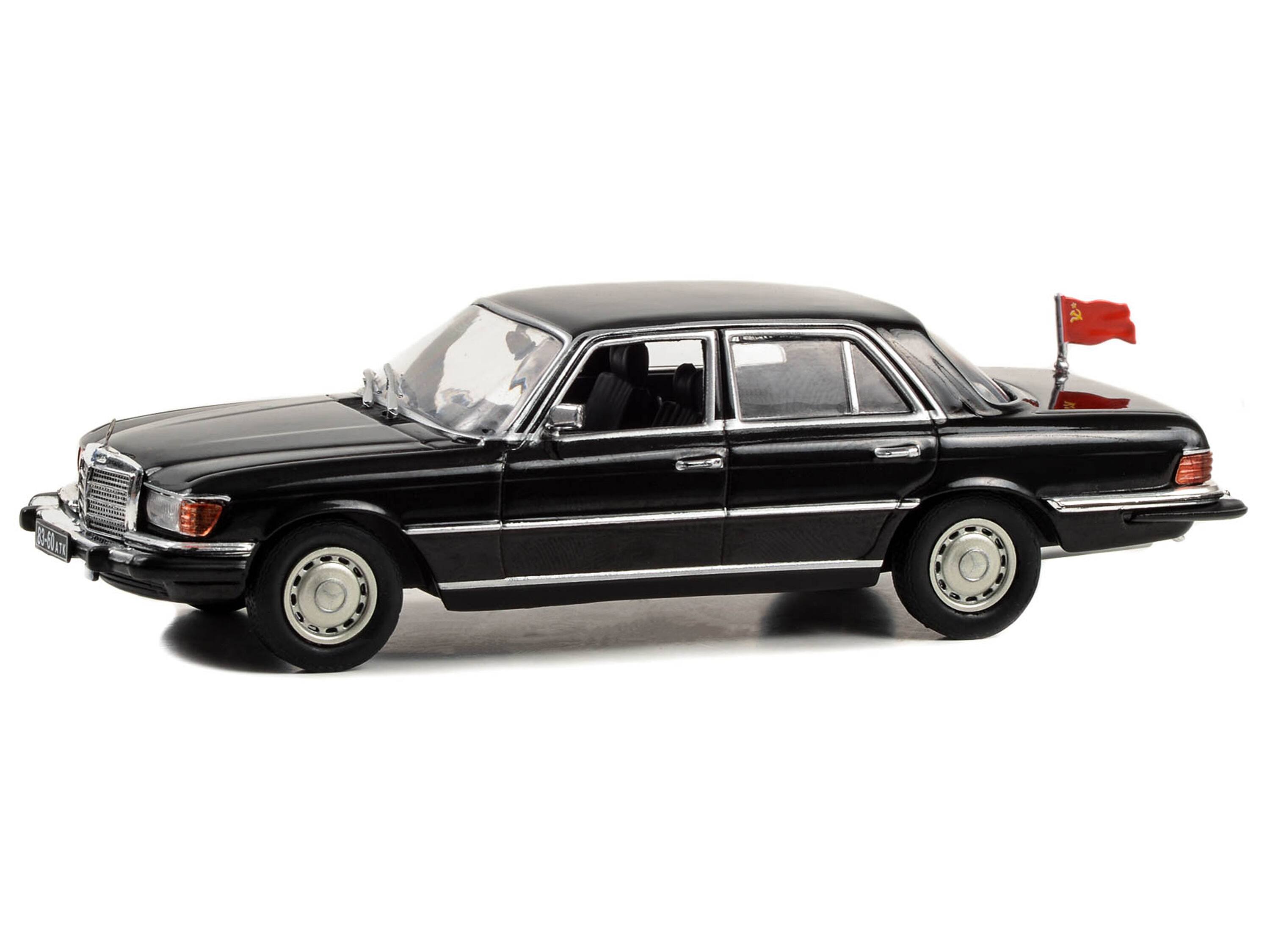 Angle. Greenlight - 1977 Mercedes-Benz 450 SEL (W116) Black with Soviet Flag "Rocky IV" (1985) Movie 1/43 Diecast Model Car by Greenlight - Black.