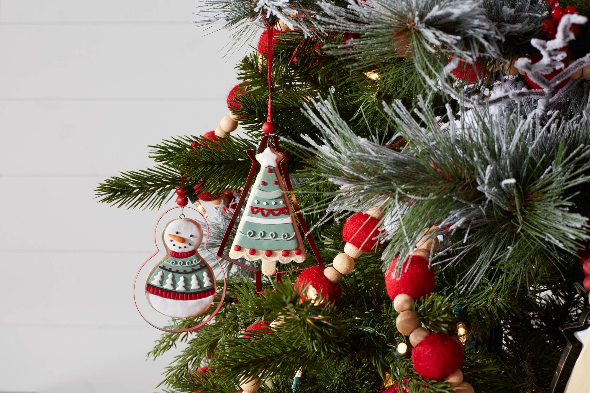 Angle. BreeBe - Metal Cookie Cutter Ornament (Set of 12) - Red, White, Green.