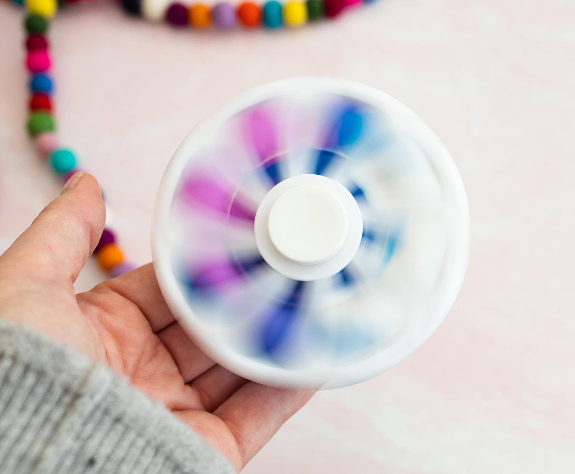 Alt View 3. Toynk - Pop Fidget Toy Spinner White Flower 8-Button Bubble Popping Game - Blue.