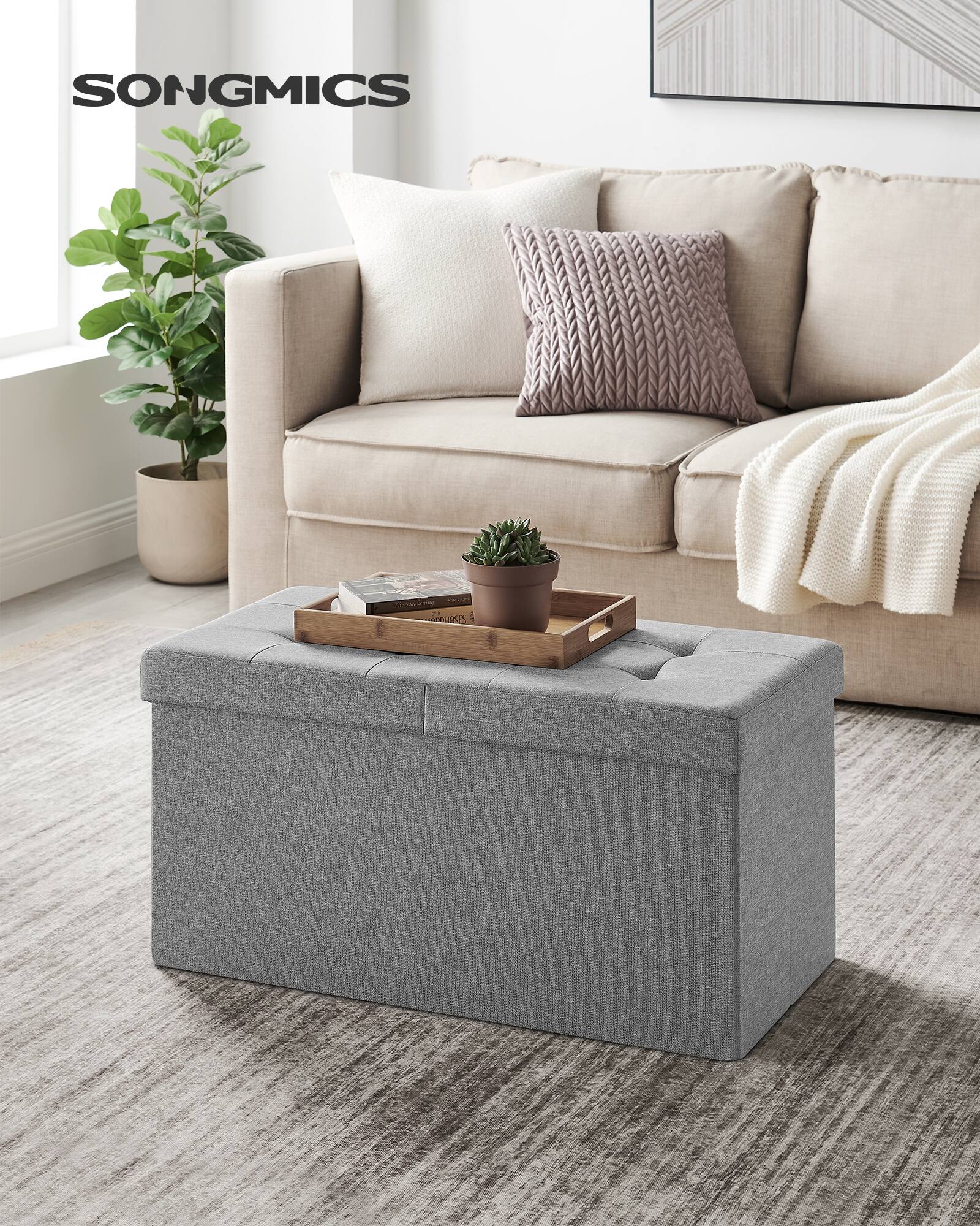Angle. Songmics Home - 30 Inches Storage Ottoman, Foldable Storage Bench with Flipping Lid, 660 lb Load Capacity, for Entryway, Living Room - Light Gray.