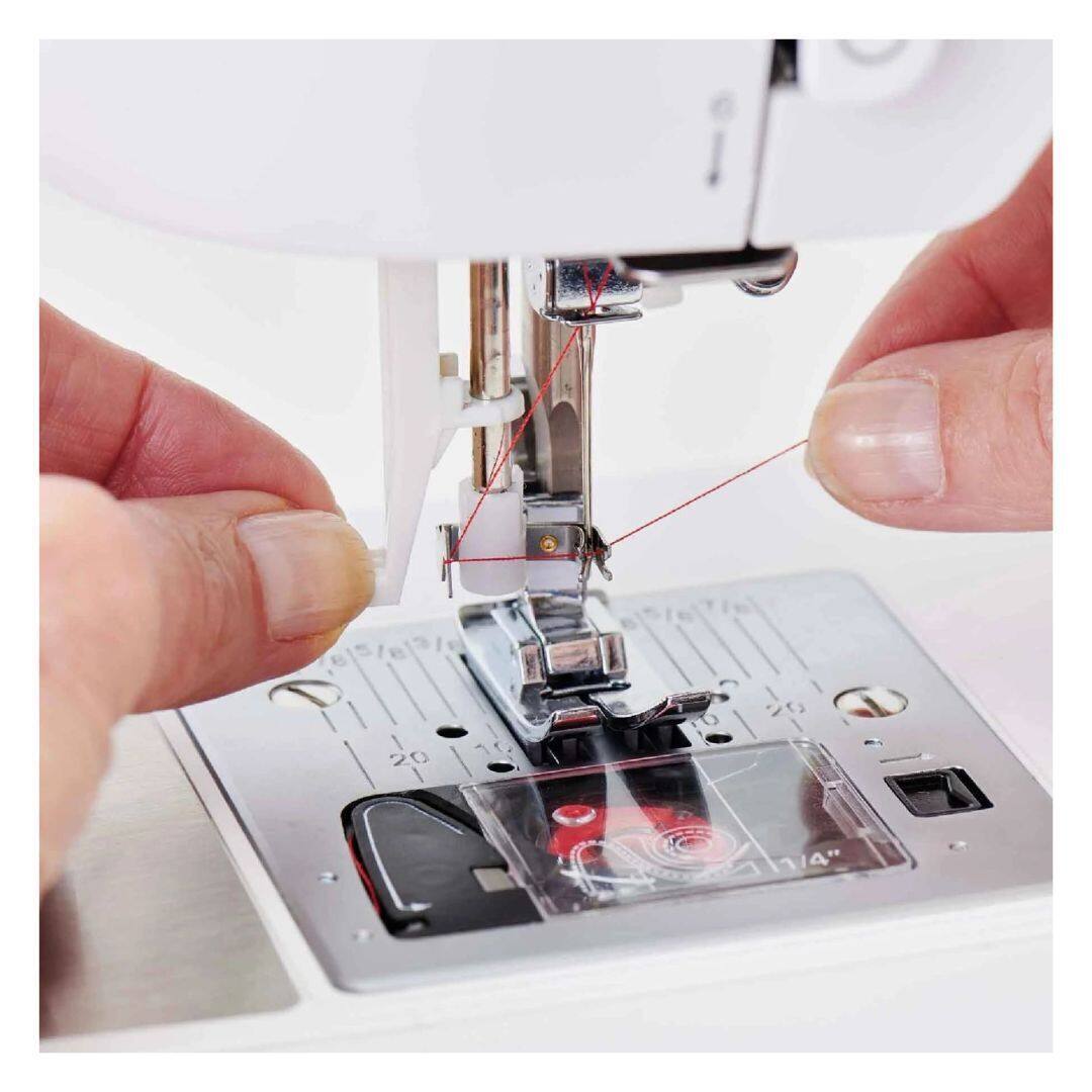 Angle. Singer - Singer Elite CE677 Computerized Sewing Machine with 200 Built-in Stitches, White.