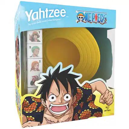 The image features a box of Yahtzee, a popular dice game. The box is decorated with a cartoon character, and the game is designed for ages 12 and up. The game includes a shaker, score pad, and shout cards, making it a fun and engaging activity for players.