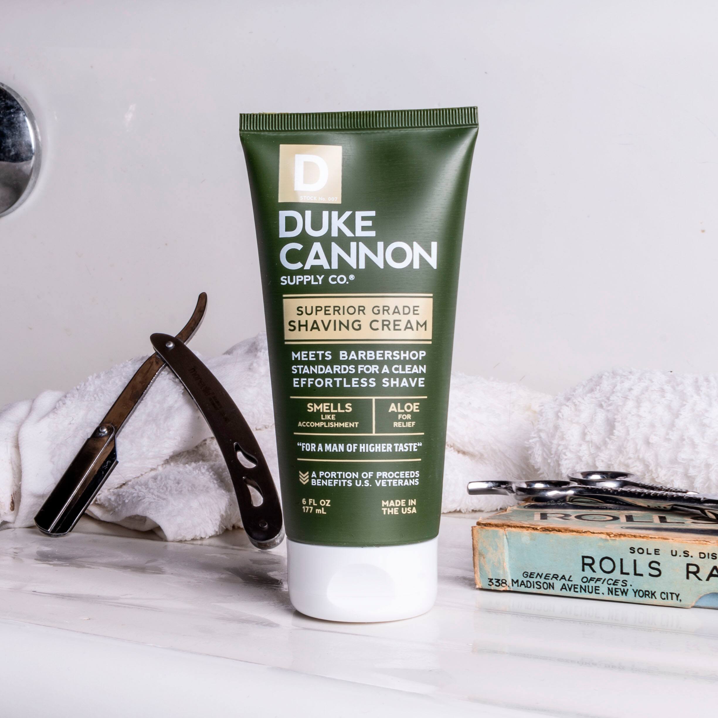 Duke Cannon Supply Co. Superior Grade Shaving Cream Meets Barbershop Standards for a Clean, Effortless Shave. Smells Like Accomplishment. Aloe for Relief. For a Man of Higher Taste. A Portion of Proceeds Benefits U.S. Veterans. 177 ml / 5.9 oz. Made in the USA.